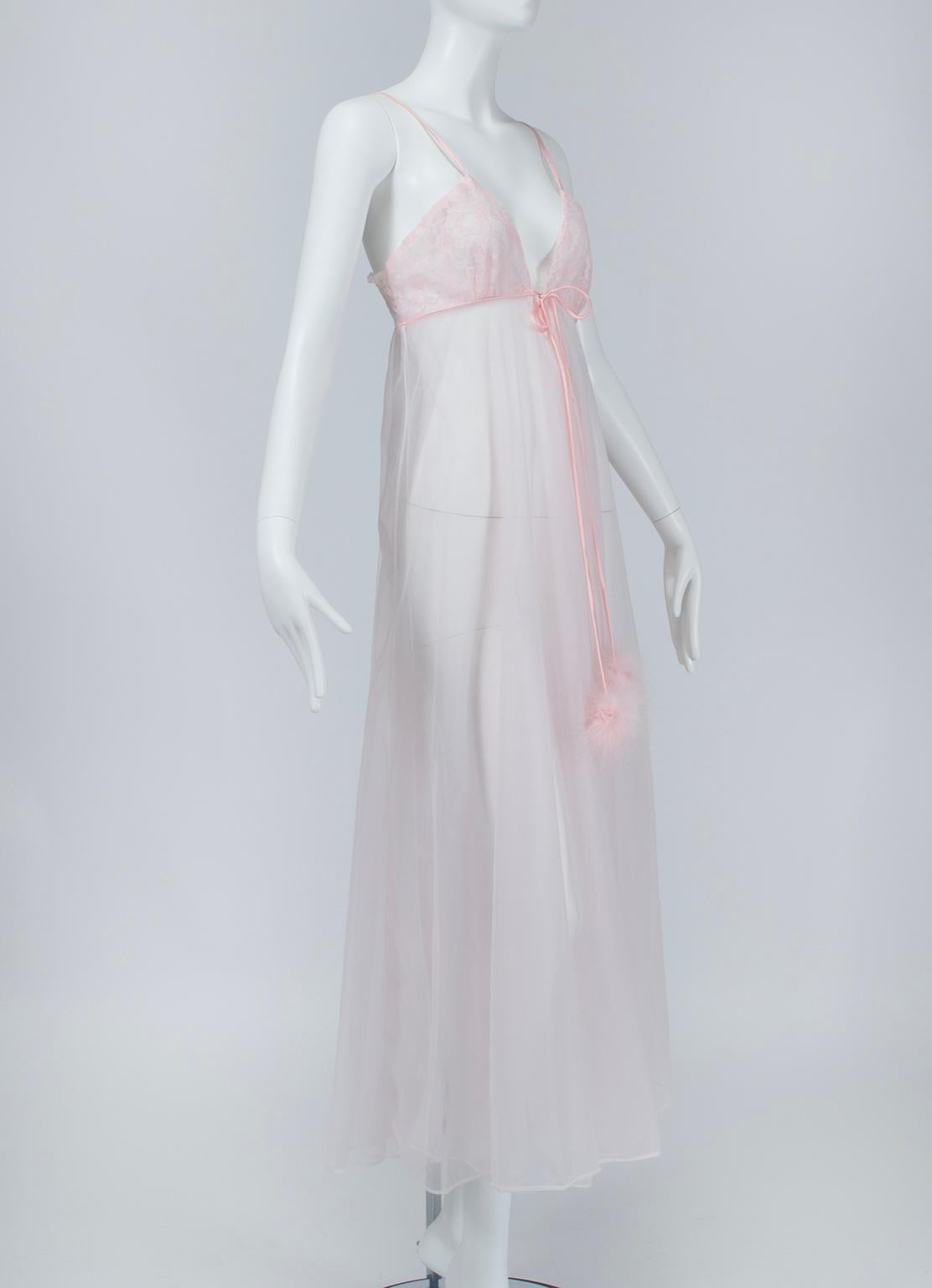Too beautiful to be kept in the bedroom, this negligée is lovely enough to wear in public. The 2 ½ foot marabou feather cords may be tied in front or back for two completely different looks.

Vintage sleeveless blush pink nightgown with satin