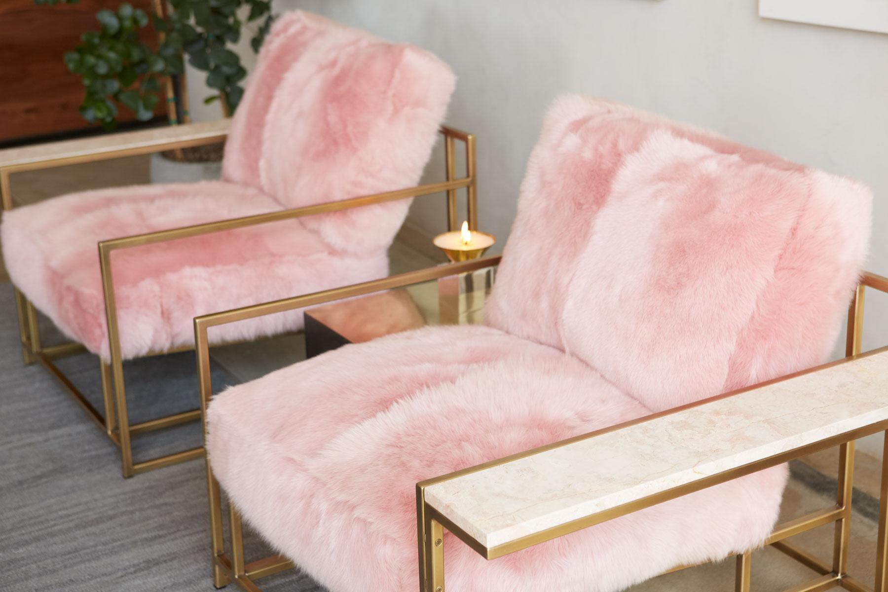 The refined design of the Inheritance Armchair is juxtaposed here with a luxurious and plush shearling upholstery set in a contemporary color palette. This set includes two Armchairs, each adorned with a tonal blush marble-topped Wing Table.

This