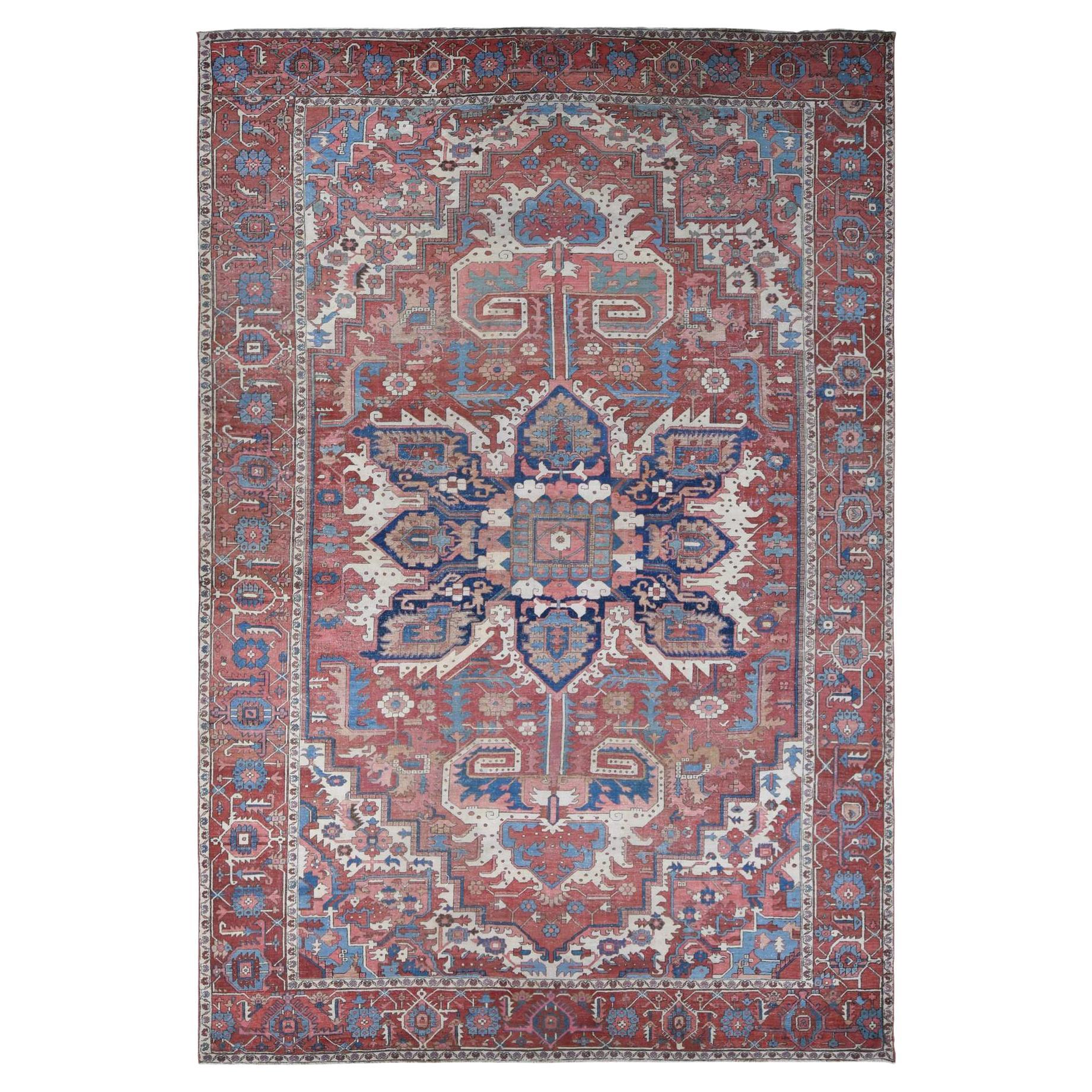 Blush Red Antique Persian Serapi Heriz Even Wear Hand Knotted Wool Oversized Rug For Sale