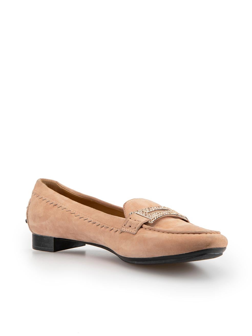 CONDITION is Very good. Minimal wear to shoes is evident. Minimal wear to the suede leather of both shoes with small scuffs this used Tod's designer resale item. These shoes come with original dust bag.



Details


Blush pink

Suede

Slip on