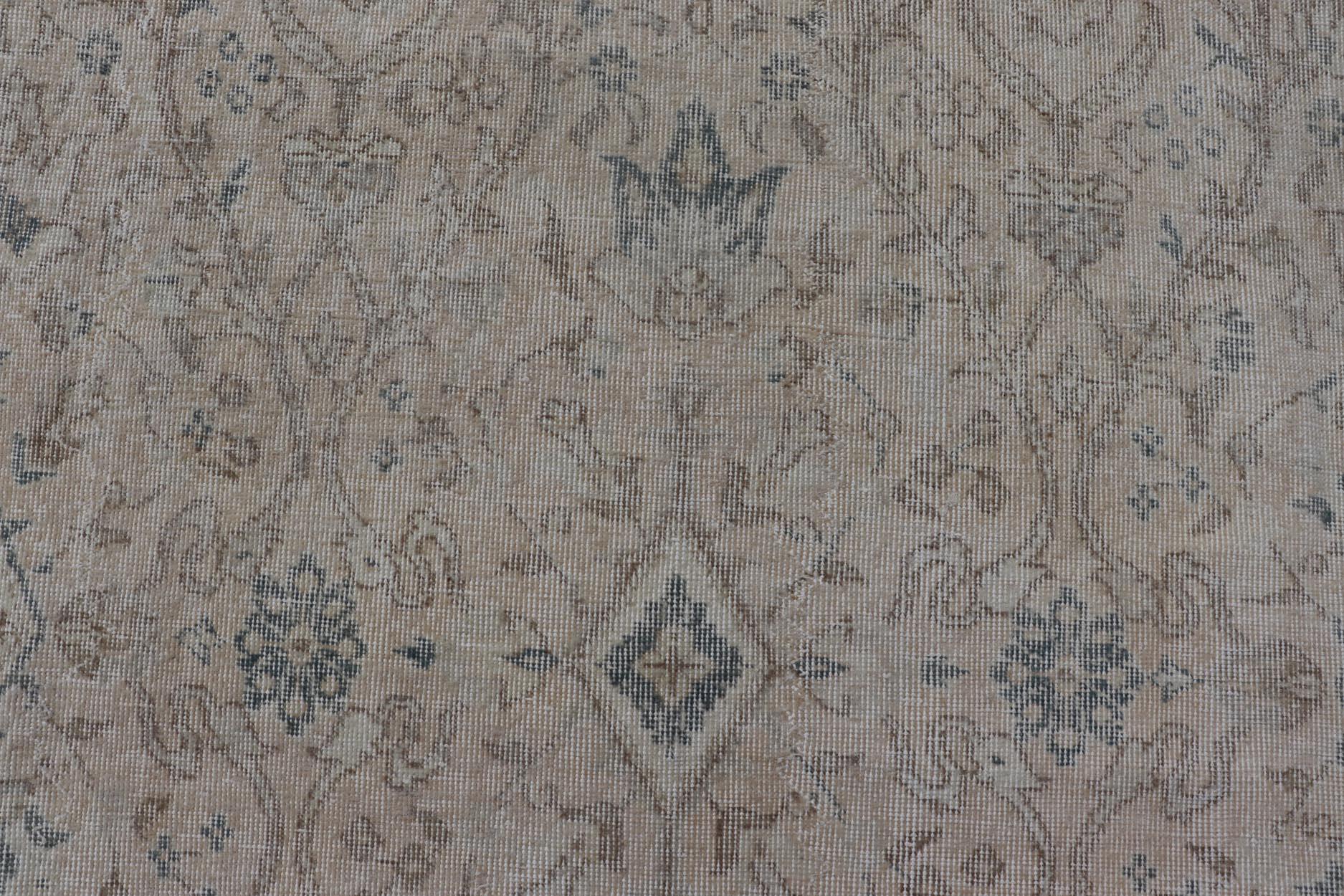 Blush, Cream, light brown, gray blue and Blue Vintage Turkish Distressed Rug with All-Over Floral Design in Tan, gray blue, light brown. Rug/EN-15414 country of origin / type: Turkey / Oushak, circa 1950.

Measures: 9'5 x 11'10 

This vintage