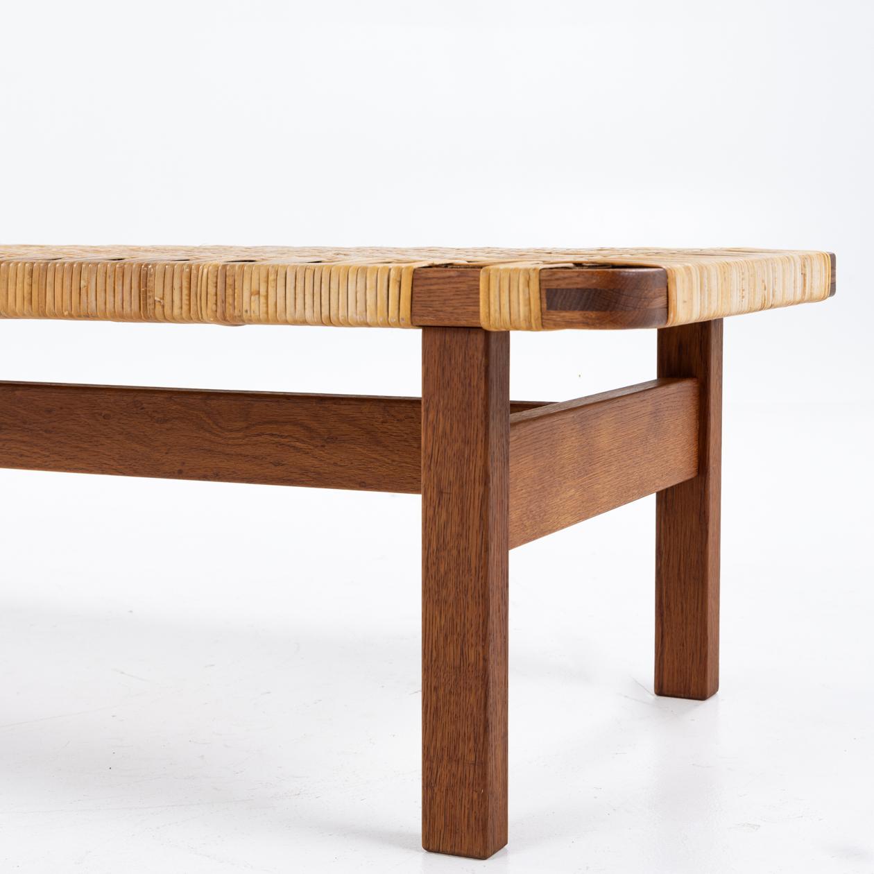 Bench / coffee table in patinated oak and cane. Designed 1950 and produced in 1972. Børge Mogensen / Fredericia Furniture.