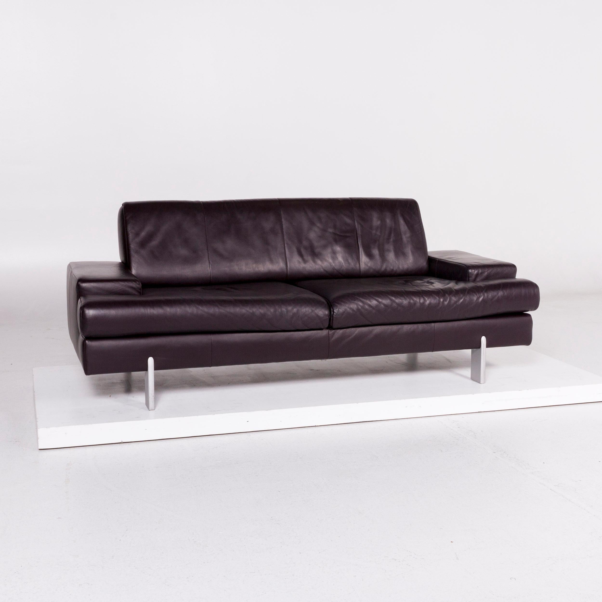 We bring to you a BMP Rolf Benz leather sofa aubergine three-seat couch.

 
 Product measurements in centimeters:
 
Depth 78
Width 199
Height 79
Seat-height 44
Rest-height 51
Seat-depth 58
Seat-width 148
Back-height 36.