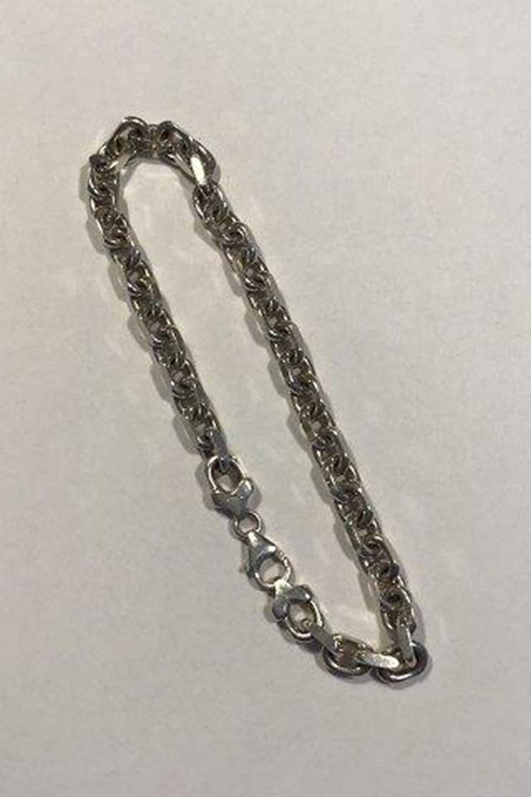 BNH Sterling Silver Bracelet.

Measures 21 cm (8 17/64 in) Weight 18 gr/0.63 oz.