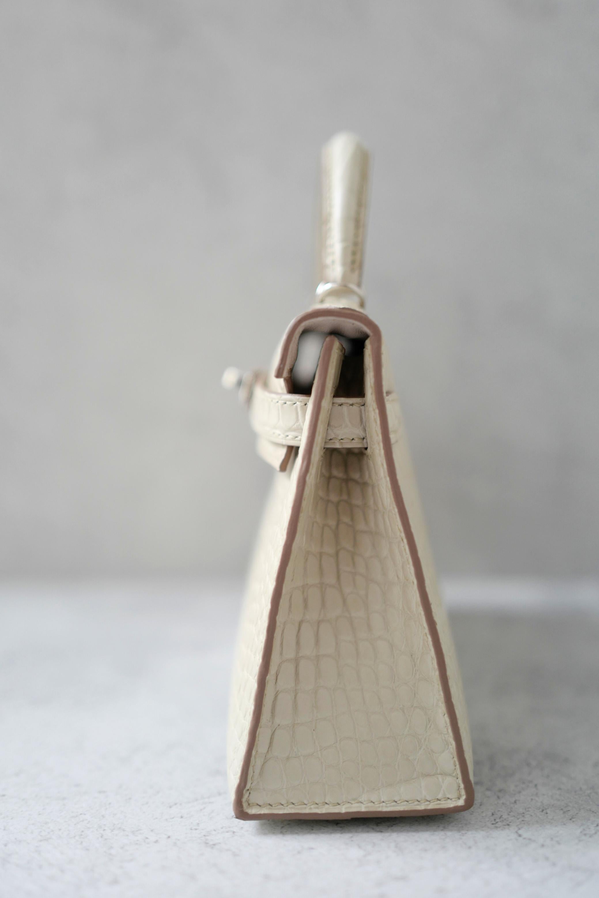 BNIB Hermès Mini Kelly 20 Beton Matte Crocodile with Palladium Hardware Stamp K For Sale 1