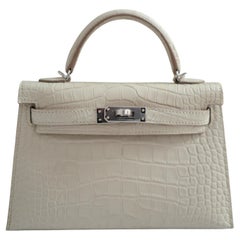 BNIB Hermès Mini Kelly 20 Beton Matte Crocodile with Palladium Hardware Stamp K