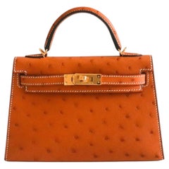 BNIB Hermes Mini Kelly HSS Cognac Ostrich with Craie Stitching GHW G Stamp 2026