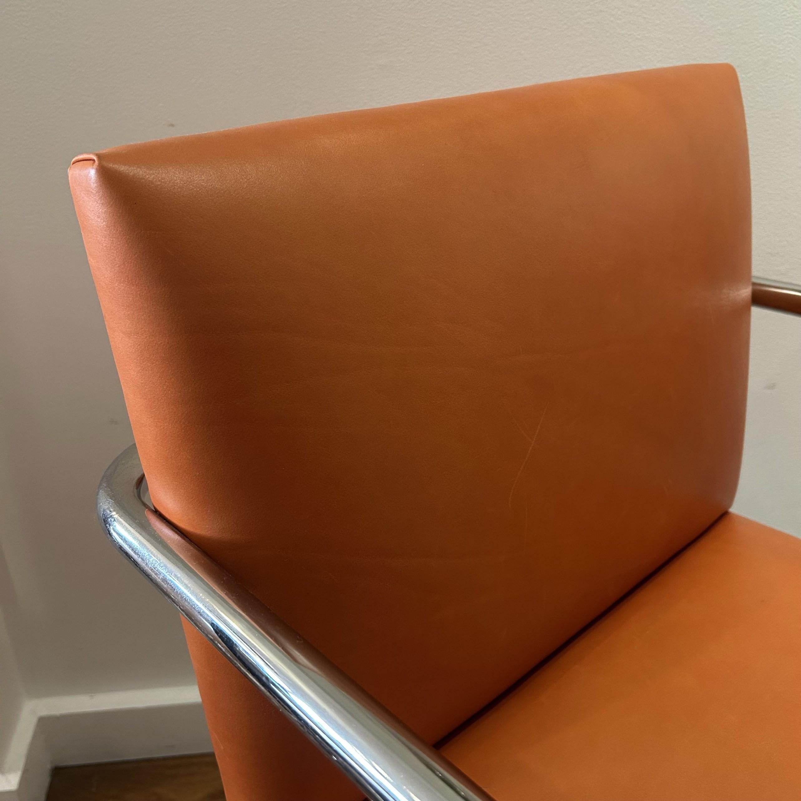 Knoll has made this incredibly comfortable and stylish chair. Complimentary orange with chrome frame will liven the seating area wherever it may be.
Chair has minor blemishes and your regular wear and