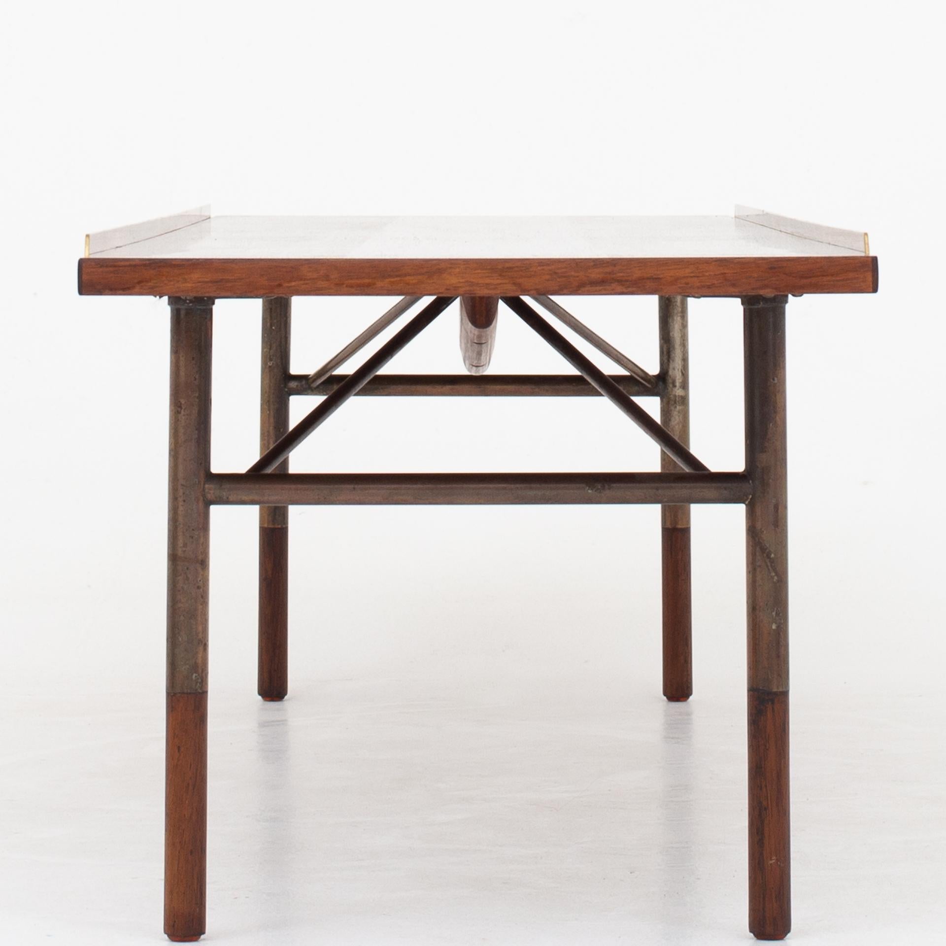 BO 101, bench/coffee table in rosewood, brass and anodized metal. Designed in 1953. Maker Bovirke.
