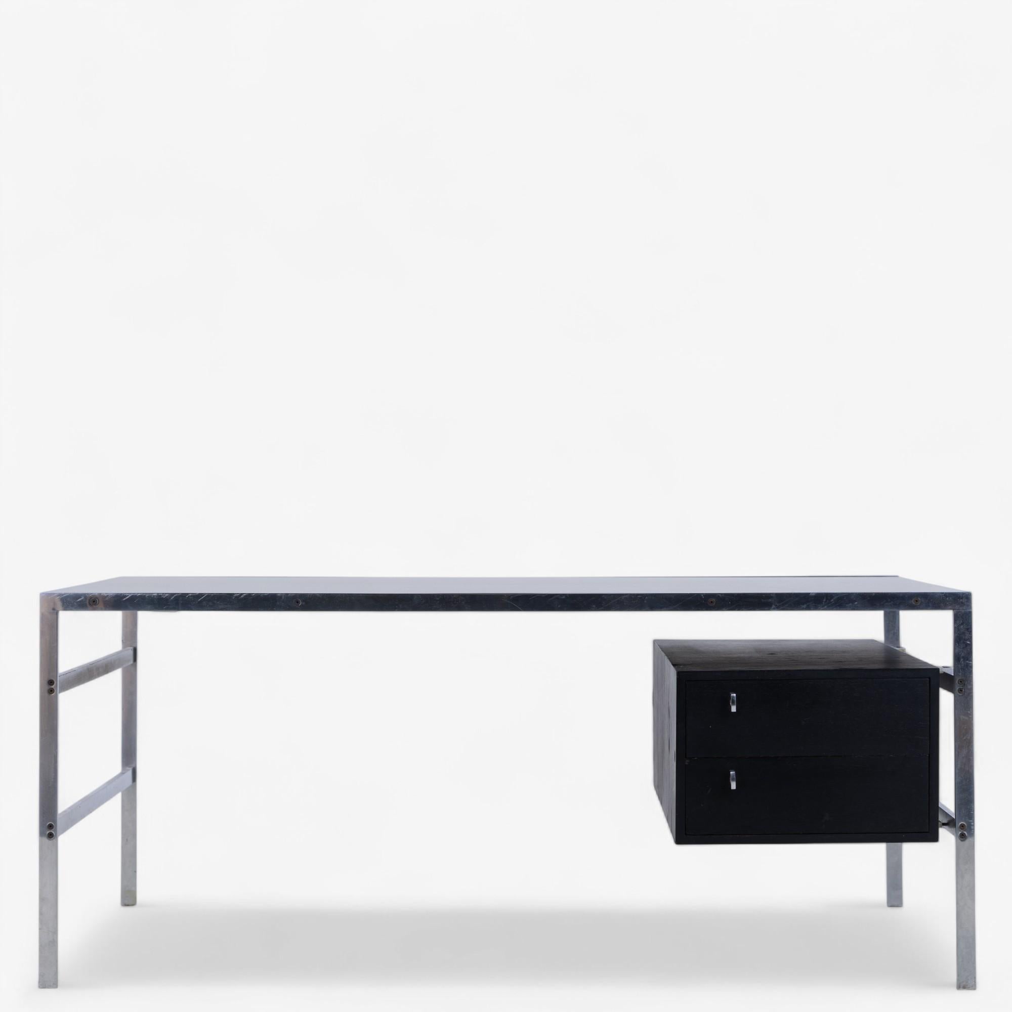 BO 550 - Desk in steel with top in 'Nero Assuloto' granite and drawer module in black wengé. Designed by Preben Fabricius & Jørgen Kastholm.