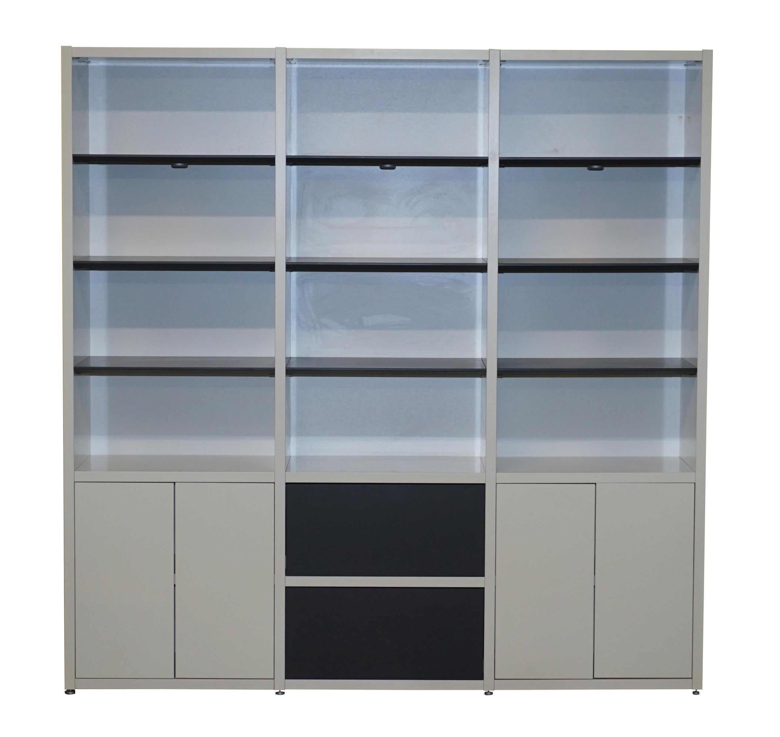 We are delighted to offer for sale this stunning Bo Concepts Copenhagen wall unit bookcase RRP £7000

A very well made piece that offers huge amounts of storage, this unit has 14 shelves and 2 drawers, there are three built in lights which offer a