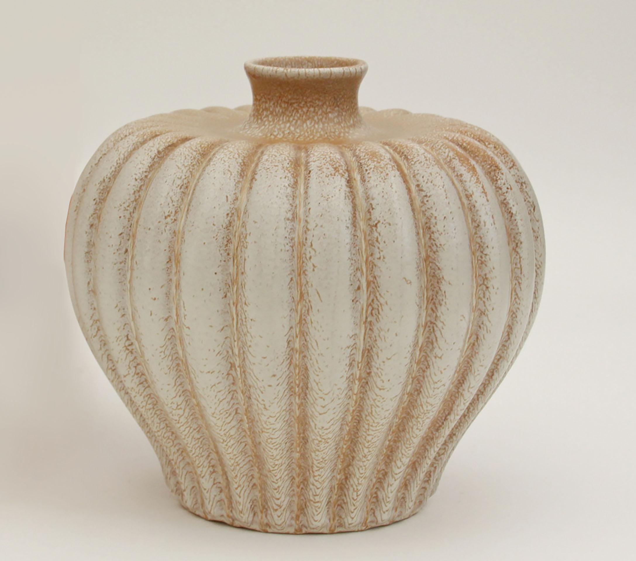 Of pumpkin shape, fluted body, white glaze marked TOPAS/Made in Sweden, Bo Fajans, D 167, and E.D.
 