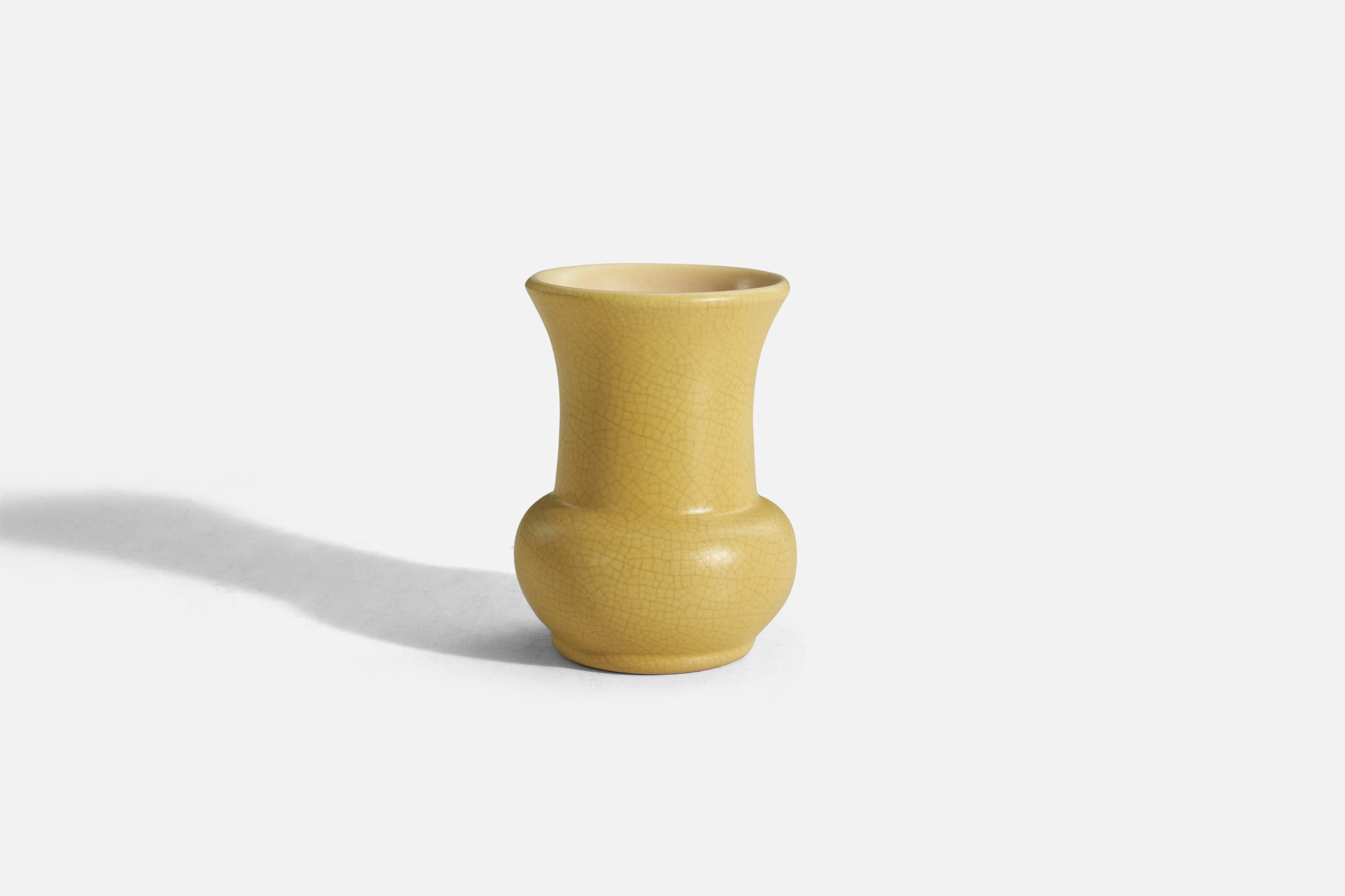 A yellow-glazed earthenware vase designed and produced by Bo Fajans, Sweden, 1930s.