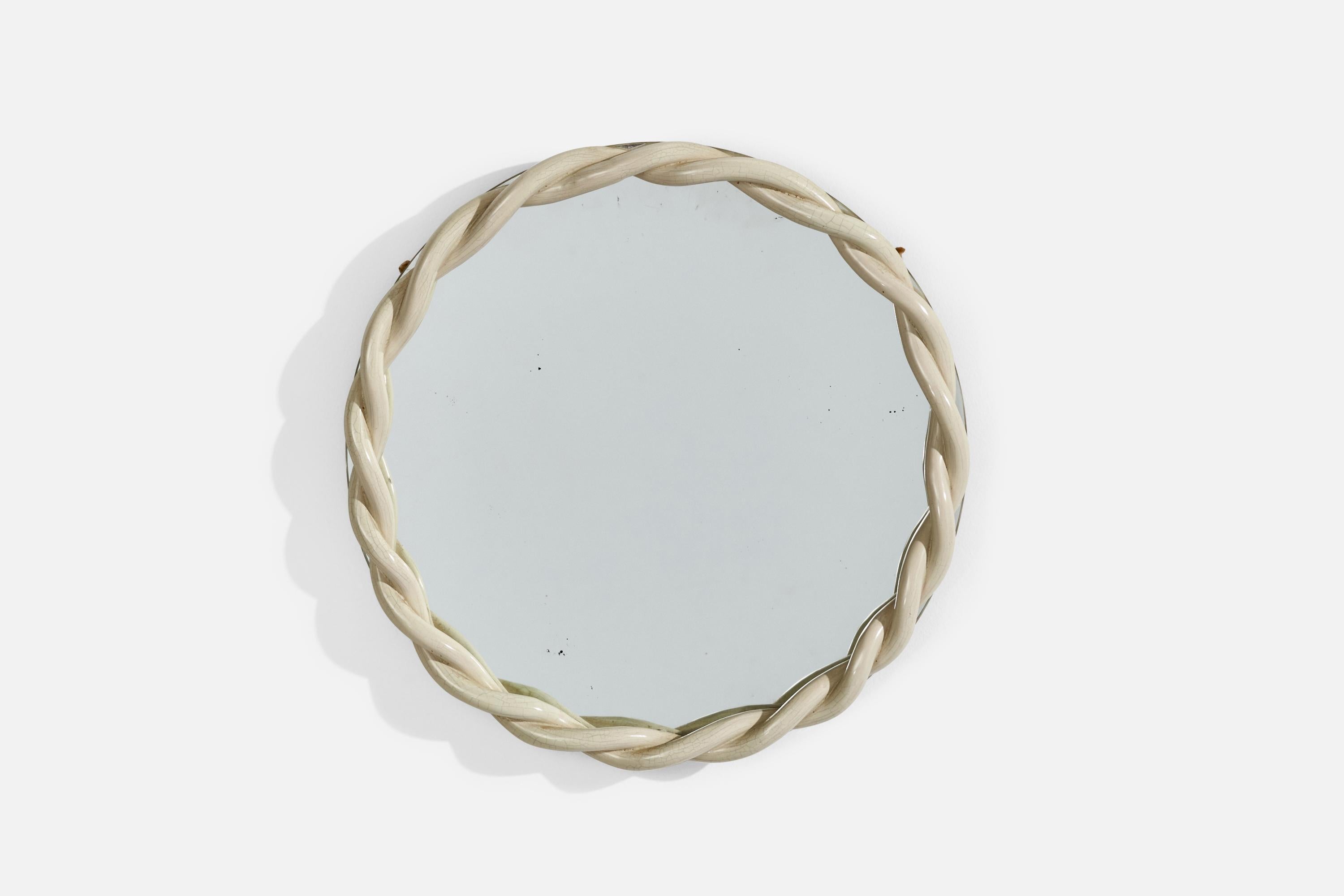 A round off-white-glazed ceramic wall mirror designed and produced by Bo Fajans, Sweden, c. 1940s.