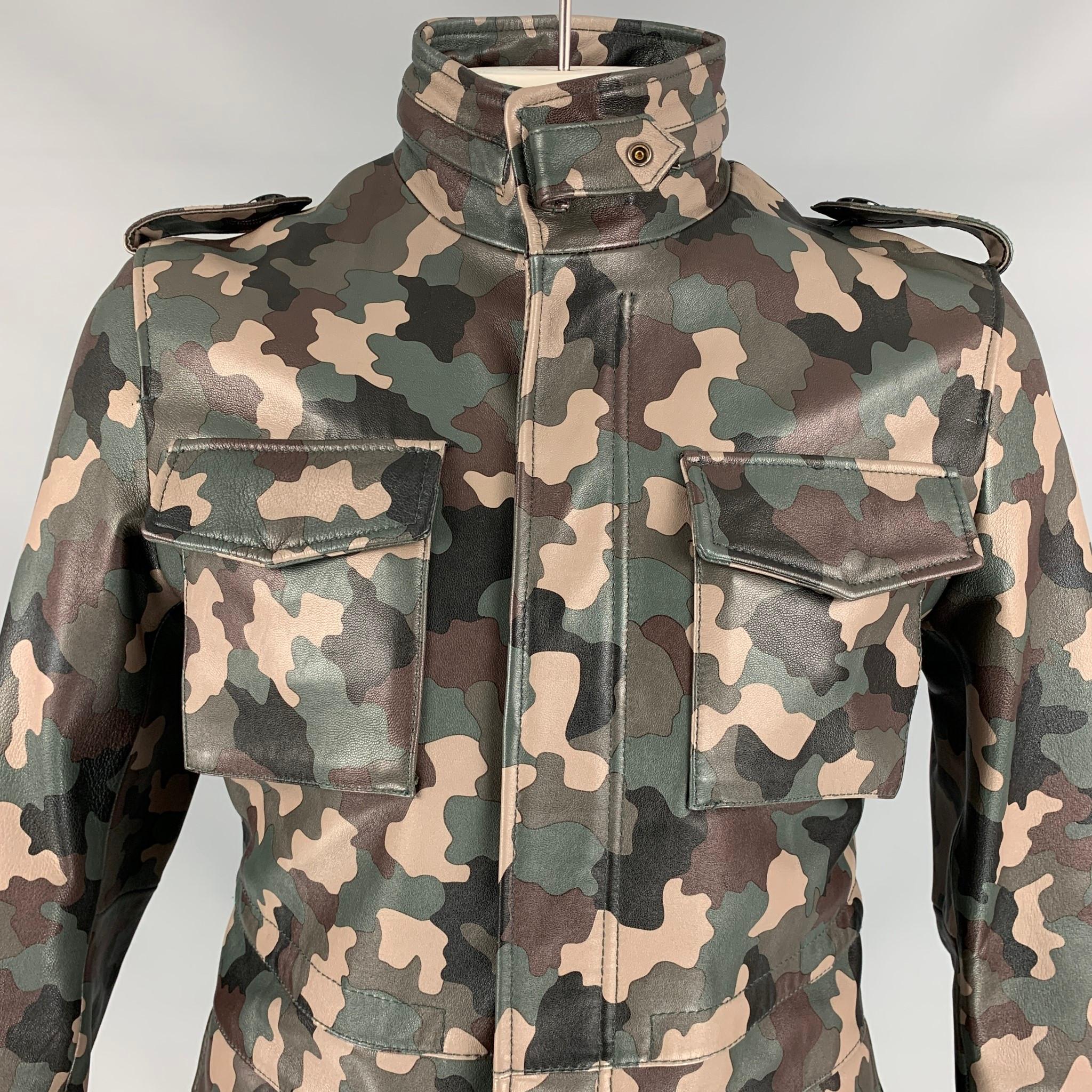 BO MIKE RONNY jacket comes in a olive & taupe camo material with a full liner featuring a parka style, slim fit, hidden hood design, flap pockets, ad a hidden zip & snap button closure. 

Very Good Pre-Owned Condition.
Marked: