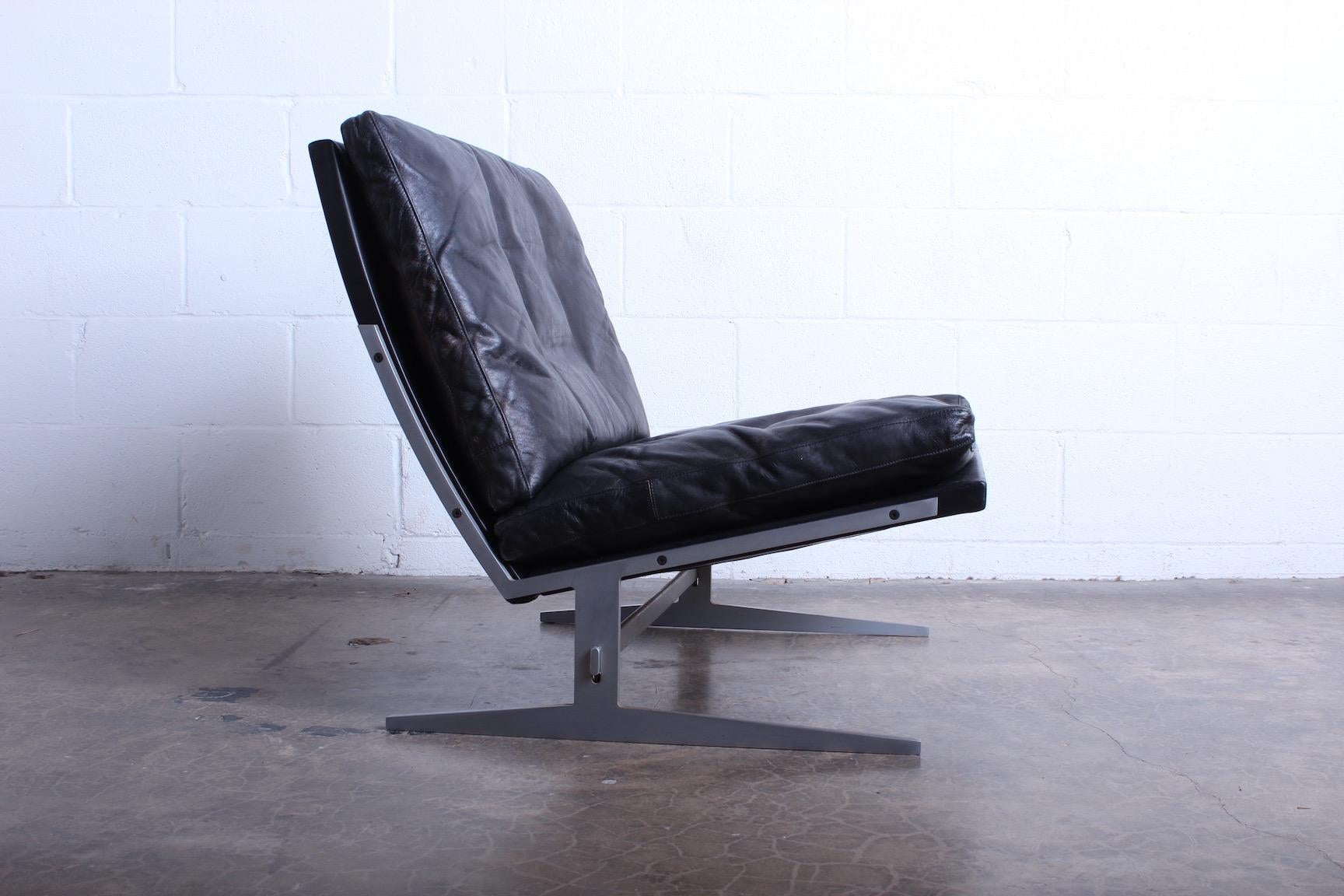 A black leather lounge chair model BO561 designed by Jørgen Kastholm & Preben Fabricius for Bo-Ex.
