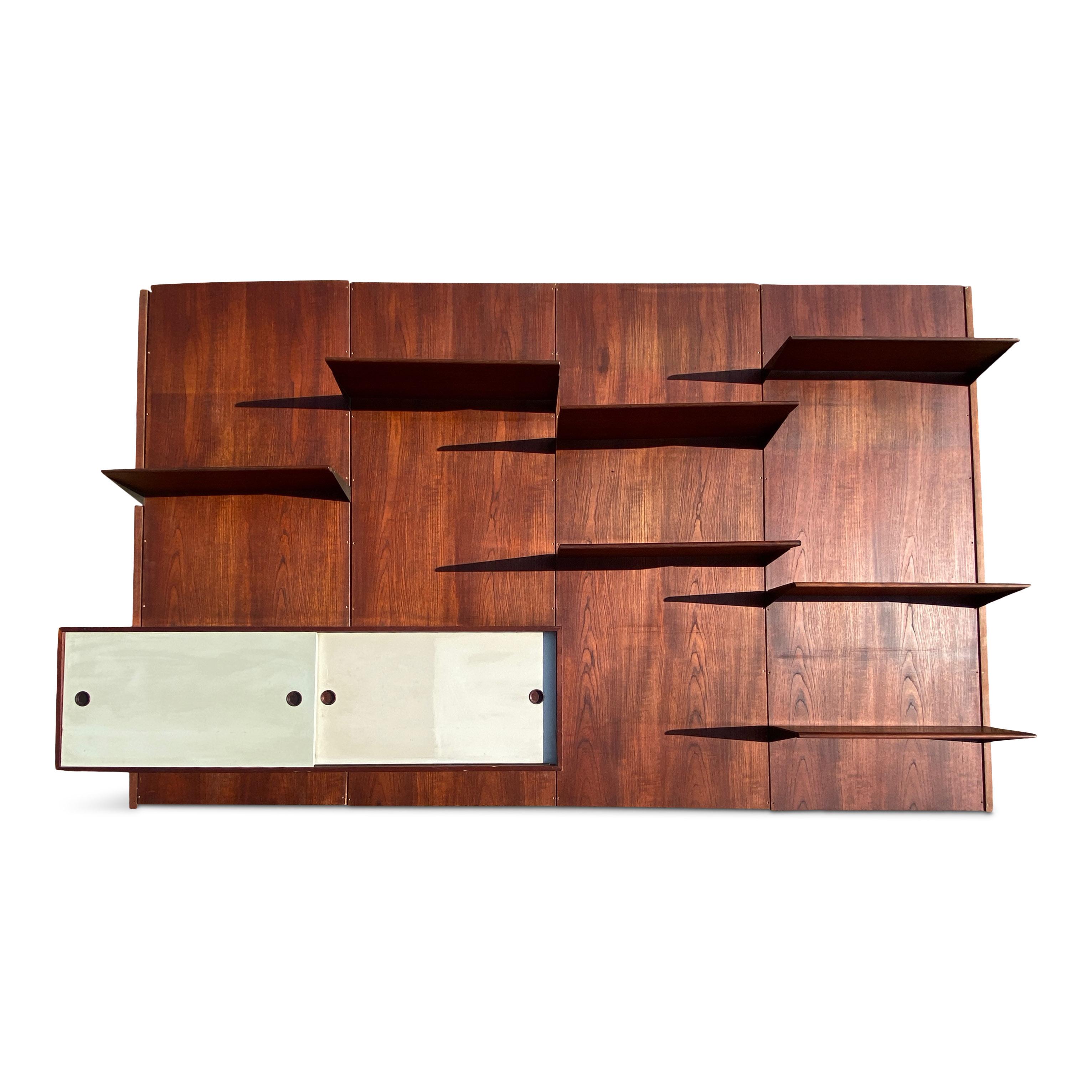 Large wall unit

By Finn Juhl for Bovirke

Teak back panels

Teak shelves with brass sides

Coloured sliding cupboard doors

Stamped with Bovirke

Denmark 1950s

The photos show the cupboards in original condition. They can be cleaned