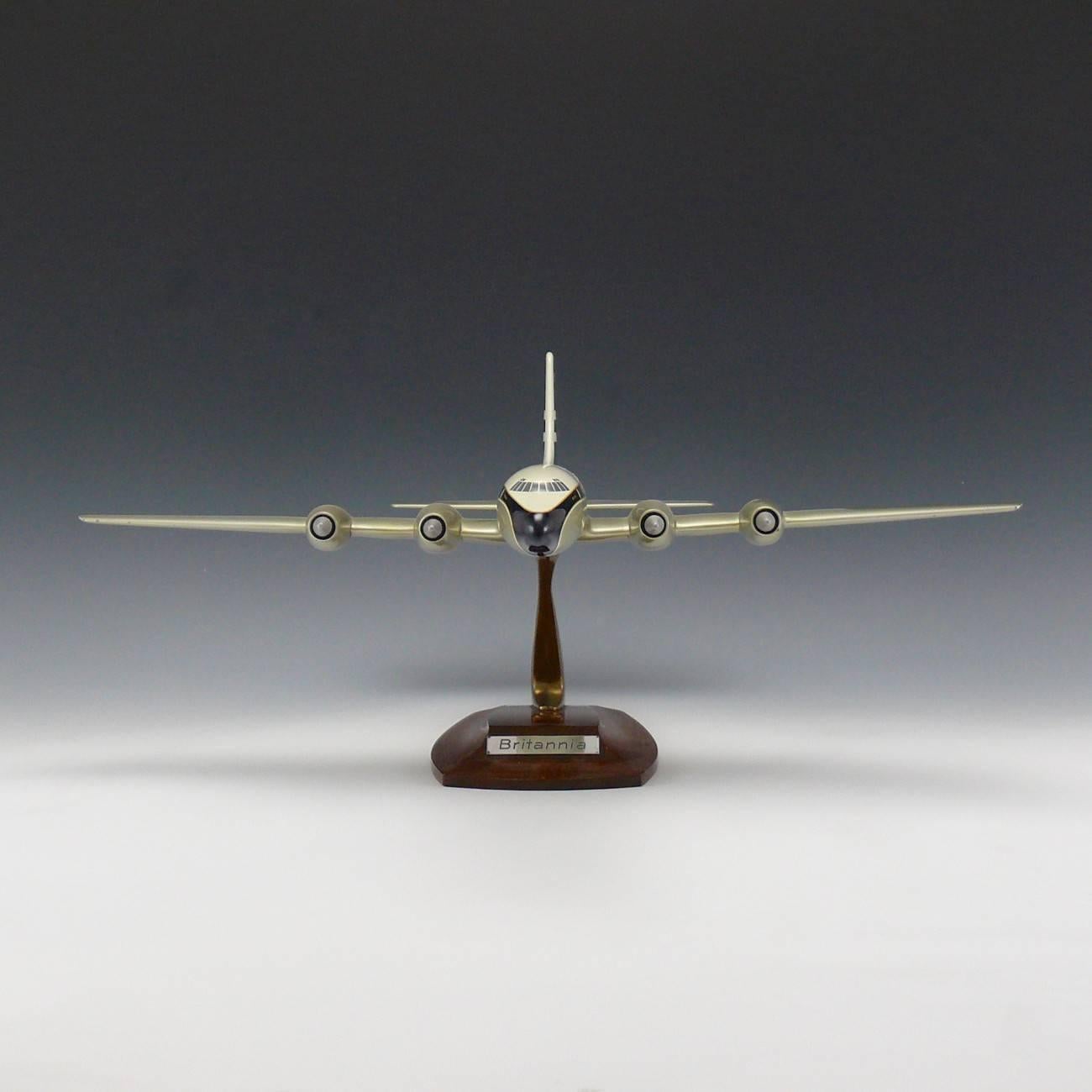 A superb painted aluminium model of a Bristol Britannia in BOAC livery, mounted on original stand with wooden base. By Walker's Westway Models, circa 1957.

Dimensions: 53 cm/20¾ inches (length) x 59 cm/23¼ inches (wing span) x 25.5 cm/10 inches