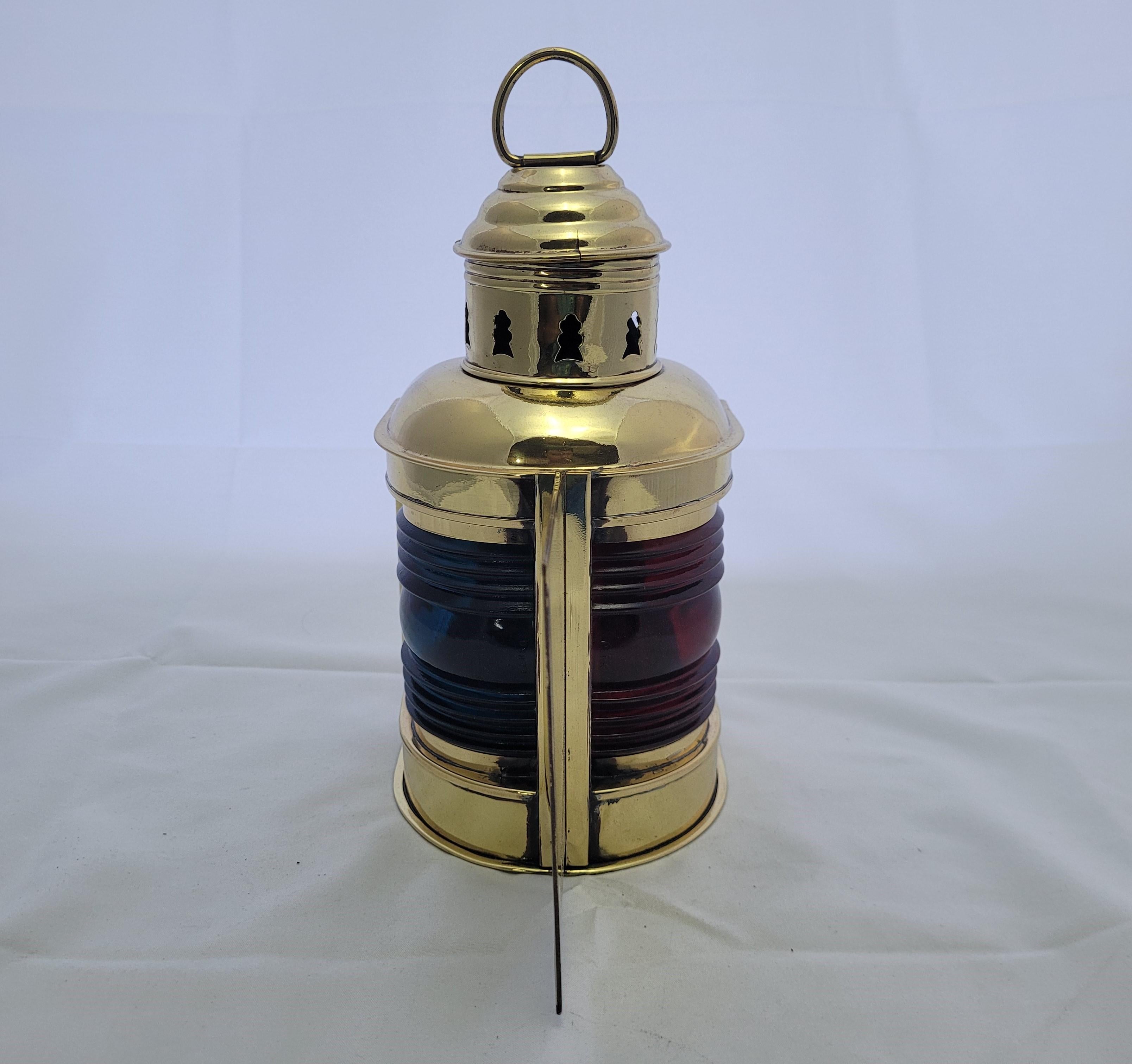 Bow lantern from a yacht by Perkins Marine Lamp Corporation of Brooklyn New York. Fitted with original burner. Meticulously polished and lacquered. Vented top and carry ring.

Weight: 2 lbs.
Overall Dimensions: 9