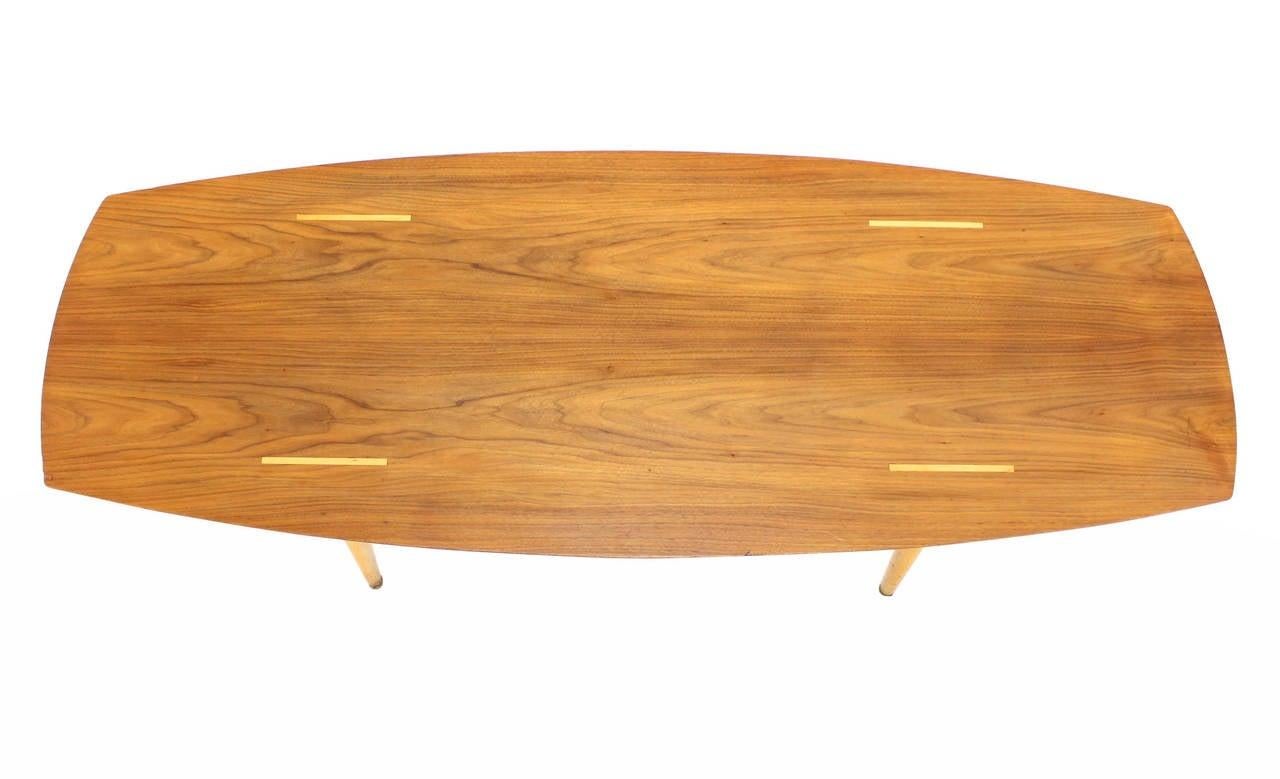 Lacquered Boat Shape Light Walnut Tapered Birch Exposed Leg Tenon Coffee Table Mid Century For Sale