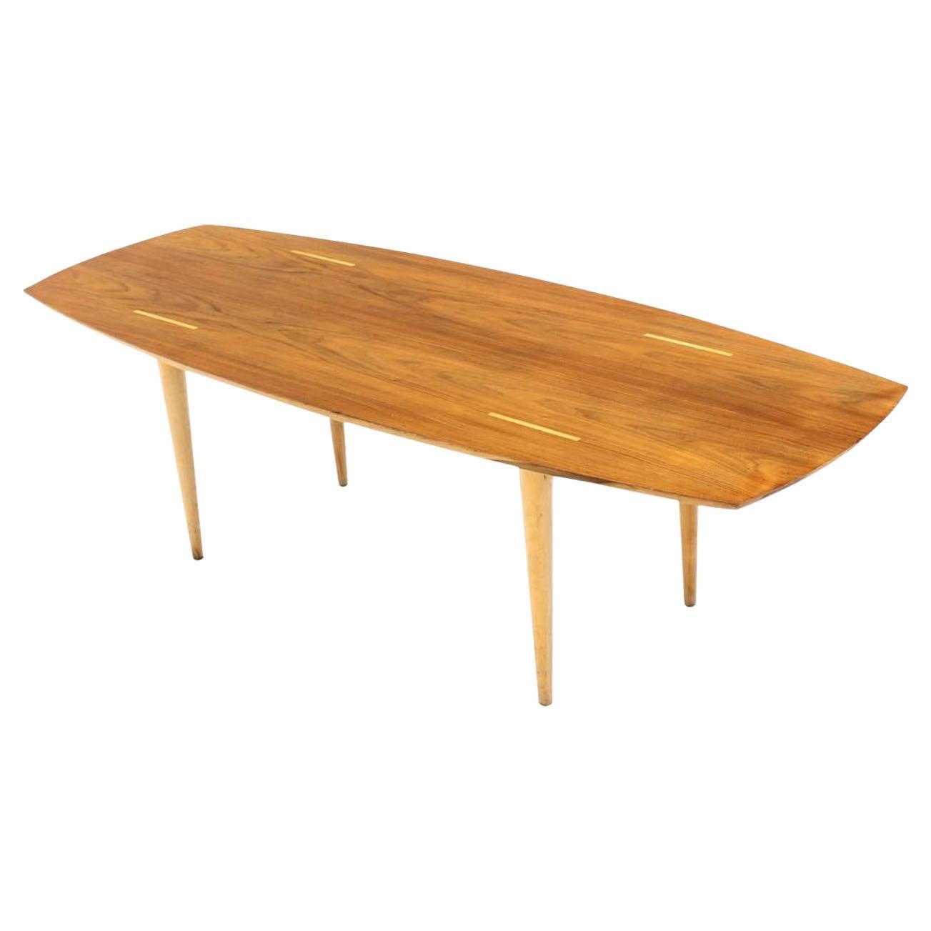 Boat Shape Light Walnut Tapered Birch Exposed Leg Tenon Coffee Table Mid Century For Sale