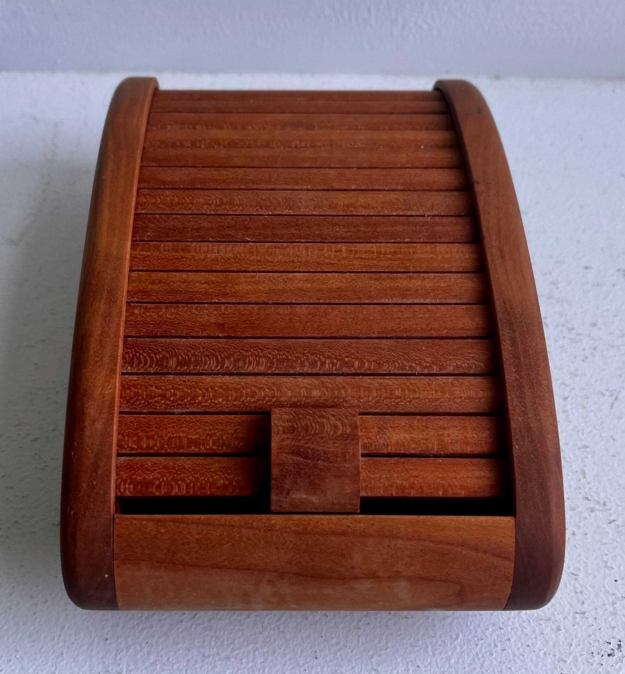 Boat Shaped Teak Box 
signed BAE, 1981

Tamborine Door
Blue Velvet on Interior

