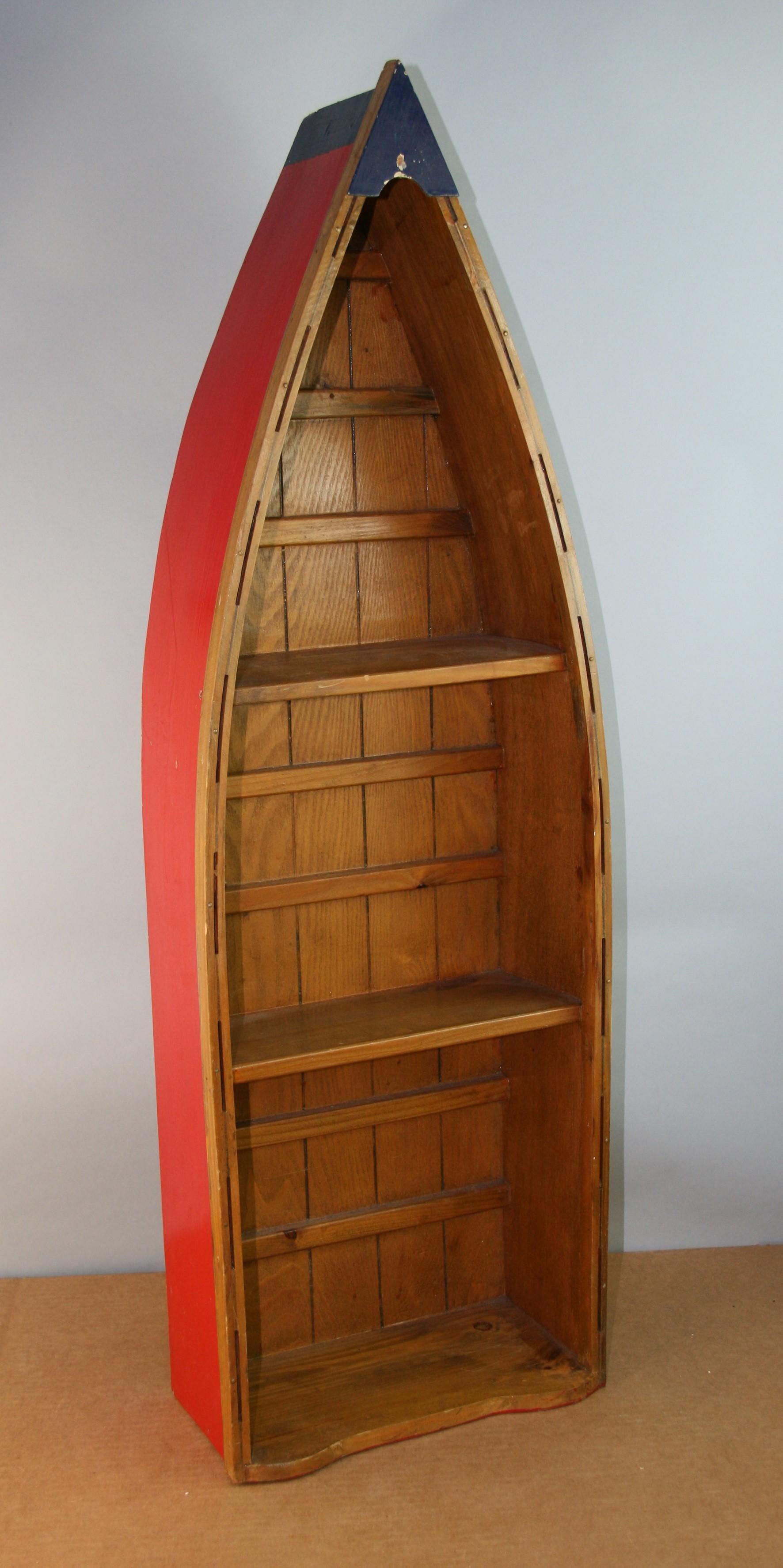 Hand made boat made into wall shelve /bookcase
shelf size 5 x 10