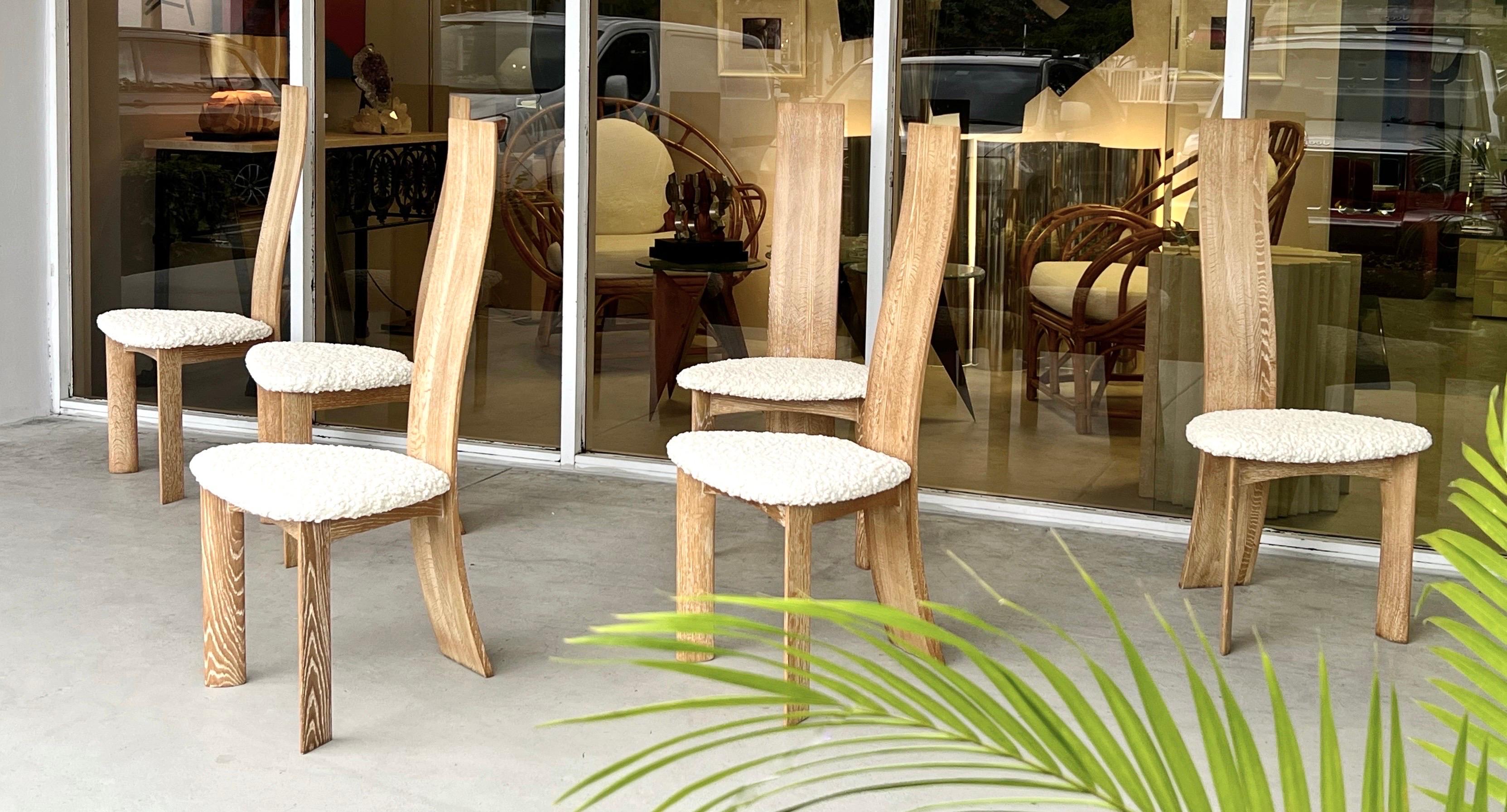 Set of 6 Cerused oak chairs by Bob & Dries Den Bergh. The chairs tall backs are slender and end extremely thin at the top. The look is very sculptural and Minimalist with a sensitive organic touch to it.
