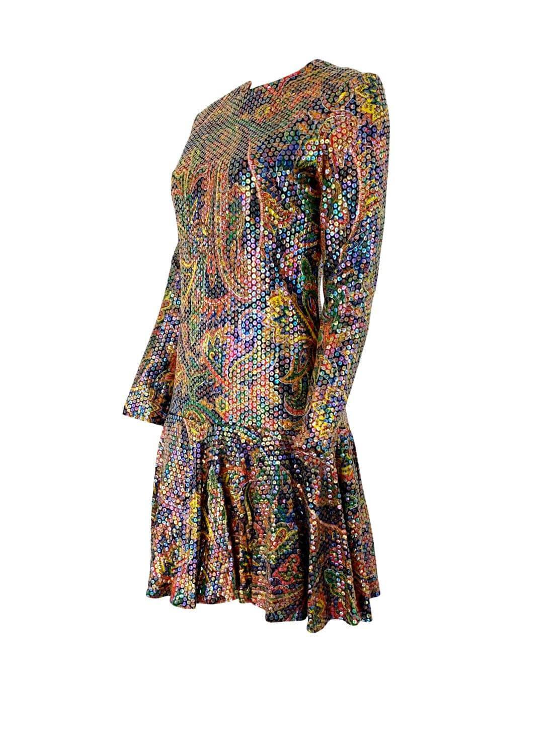 Such a fun cocktail dress! This vintage late 1960s designer Bob Bugnand dress is an explosion of color, with a multi-colored Indian paisley print fabric completely covered in transparent aurora borealis iridescent sequins. The drop waist and short