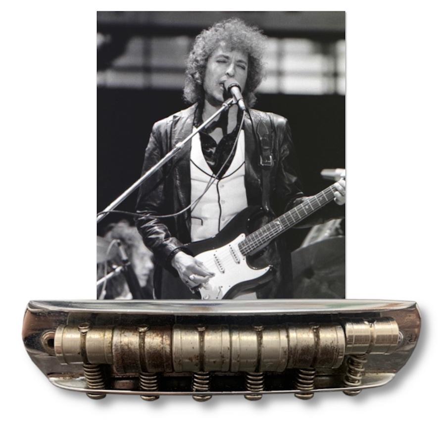 An original Bob Dylan owned and used guitar bridge

Bob Dylan (1941 - ) is one of the greatest songwriters and most significant musical artists of all-time.

Over the course of more than 60 years he's sold more than 150 million records.

His songs