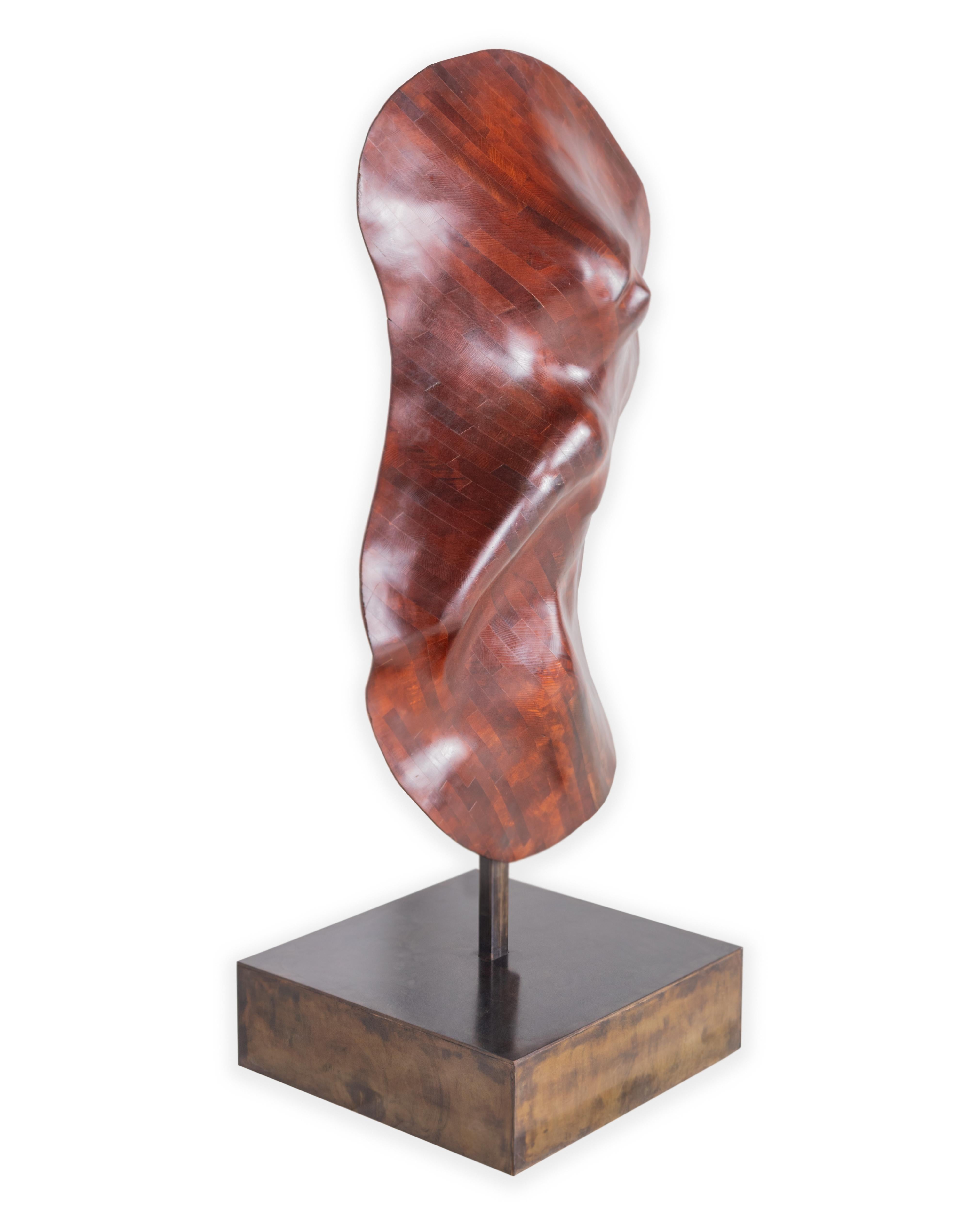 Wood sculpture mounted on custom metal stand. In my organic, contemporary, vintage and mid-century modern style.

Curated for our one of a kind line, Le Monde. Exclusive to Brendan Bass.