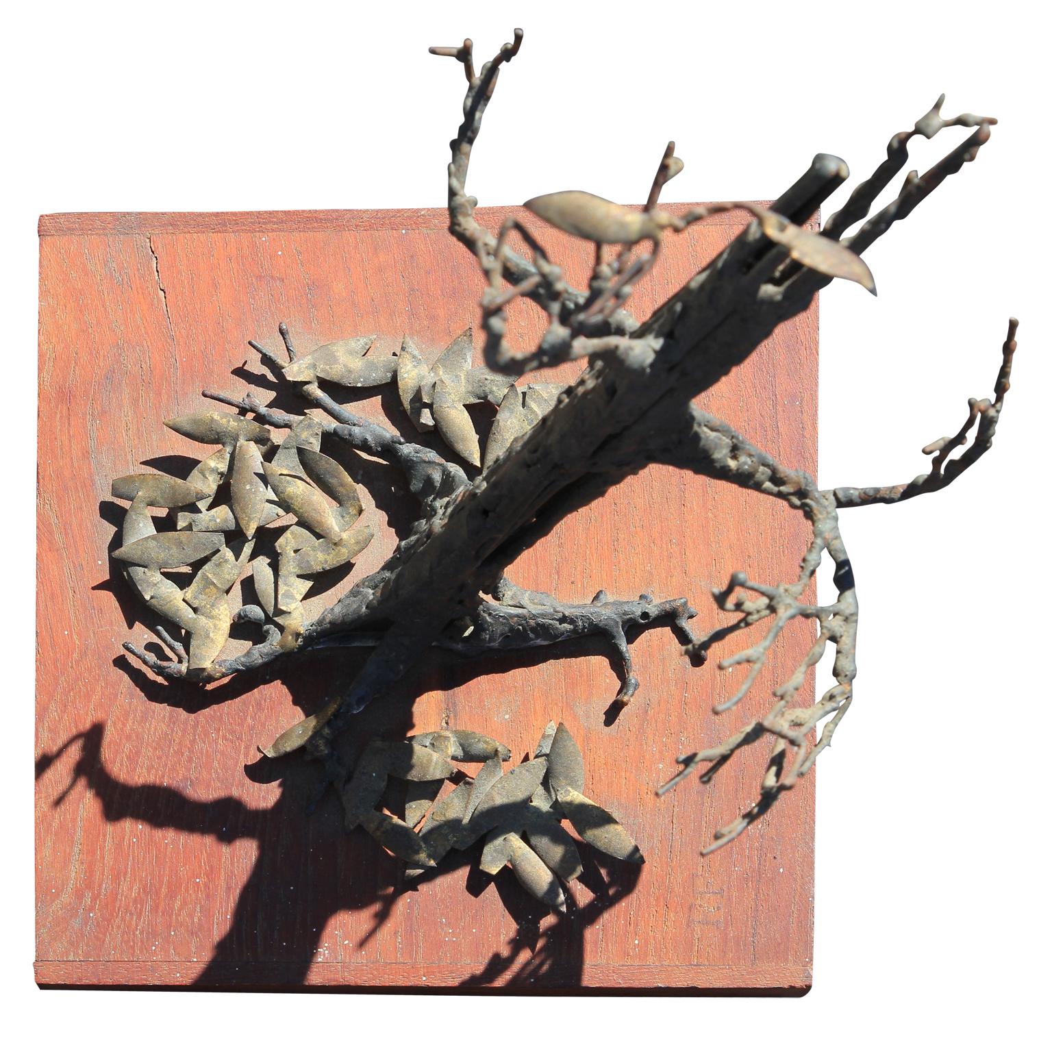 Modern abstract metal sculpture by Houston artist Bob Fowler. The work features a withering tree that has lost its leaves. The brutalist style perfectly captures the energy of the gnarled branches. Firmly attached to a natural wood base. The