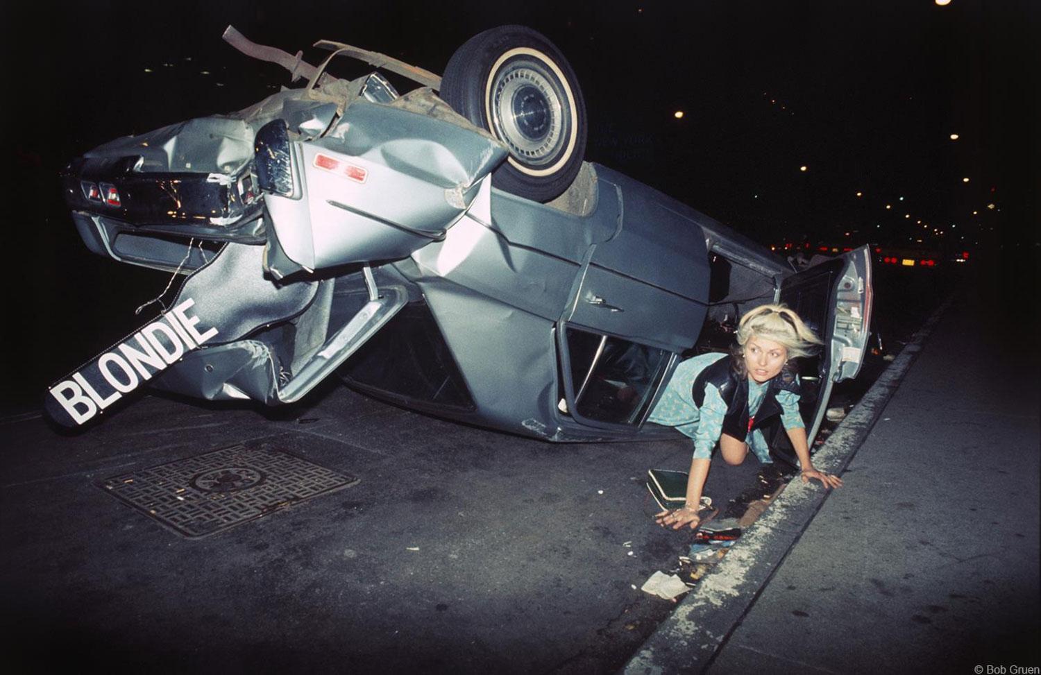 Bob Gruen Color Photograph - Debbie Harry, NYC (Car Wreck)