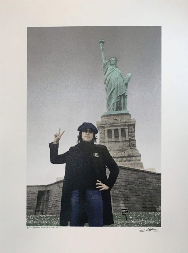 Bob Gruen Portrait Photograph - John Lennon, Statue of Liberty, New York City 