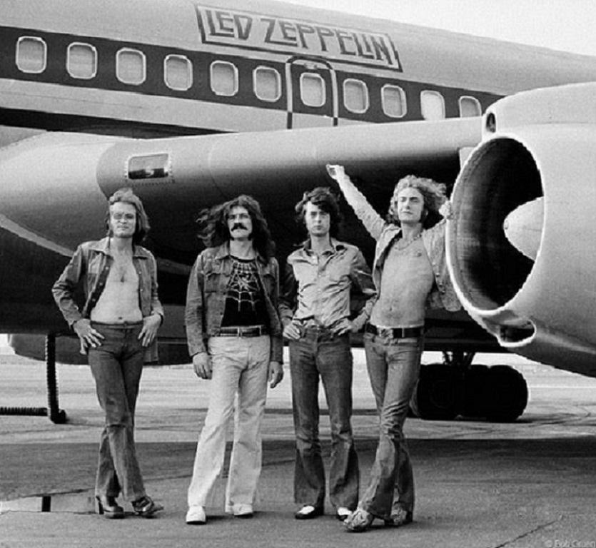 Bob Gruen Portrait Photograph - Led Zeppelin in front of The Starship, 1973