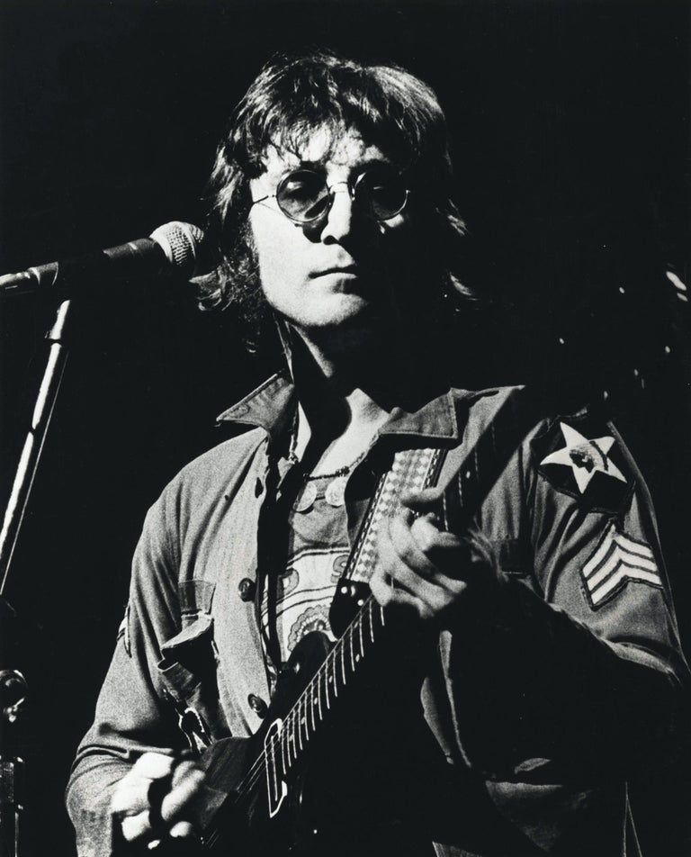 Rare Vintage Bob Gruen John Lennon press photograph, circa 1972 (John Lennon at Madison Square Garden 1972): 
John Lennon at Madison Square Garden 1972 photographed by the legendary Bob Gruen. John Lennon had the idea to perform a live benefit for