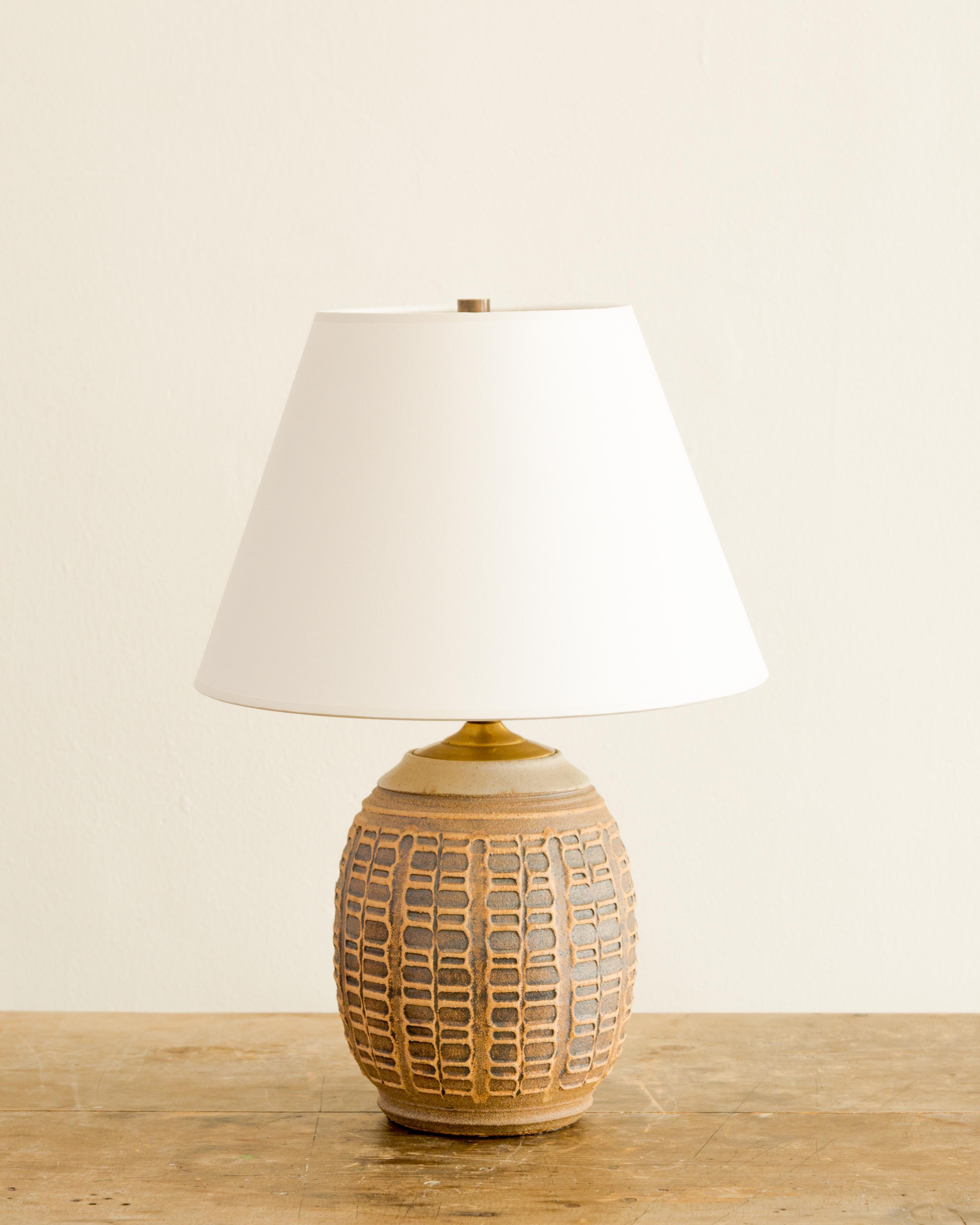 Stoneware lamp base with relief texture design by Bob Kinzie, United States circa 1960's.