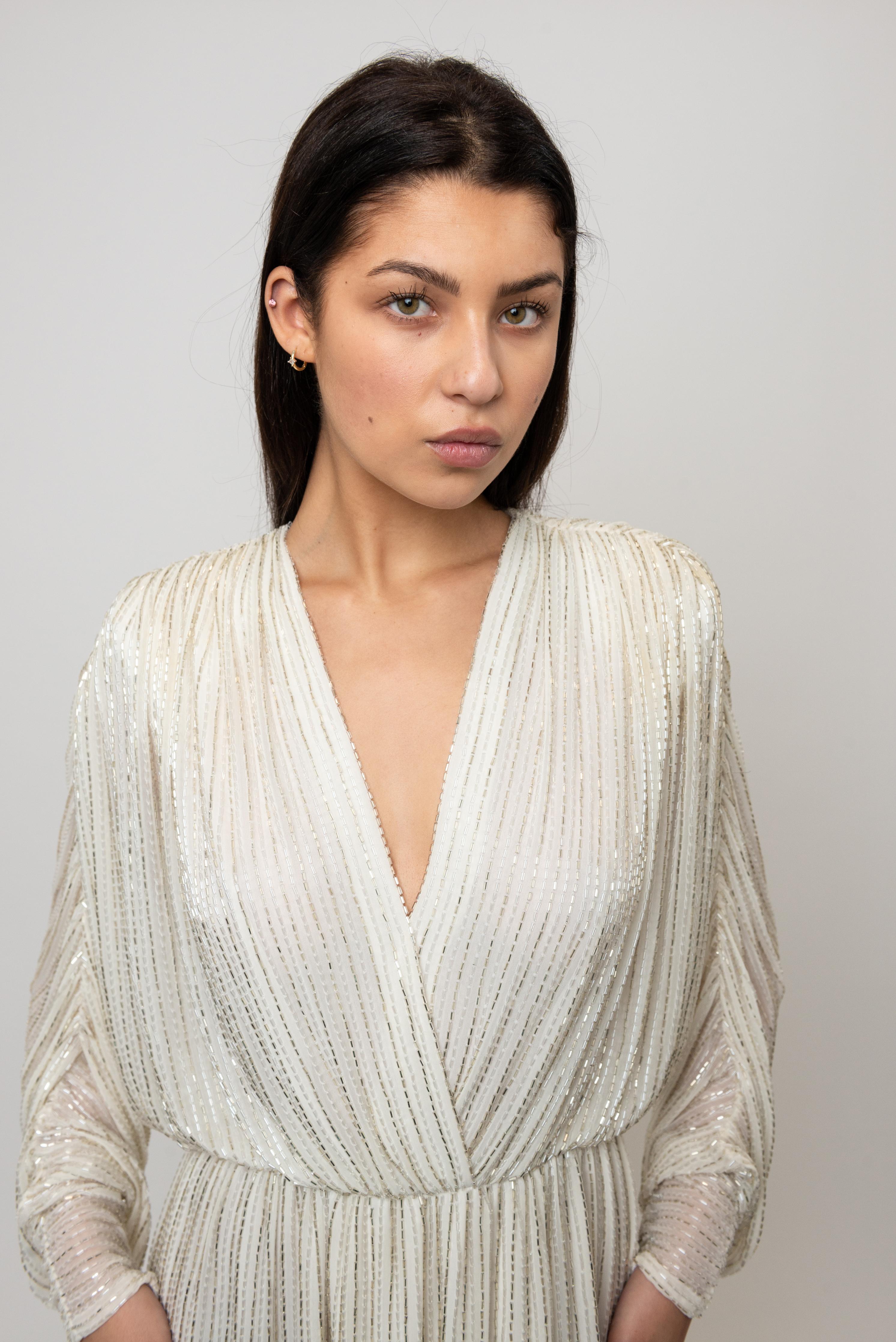 Bob Mackie 1970's White Long Sleeved Fully Beaded Gown (Weiß) im Angebot