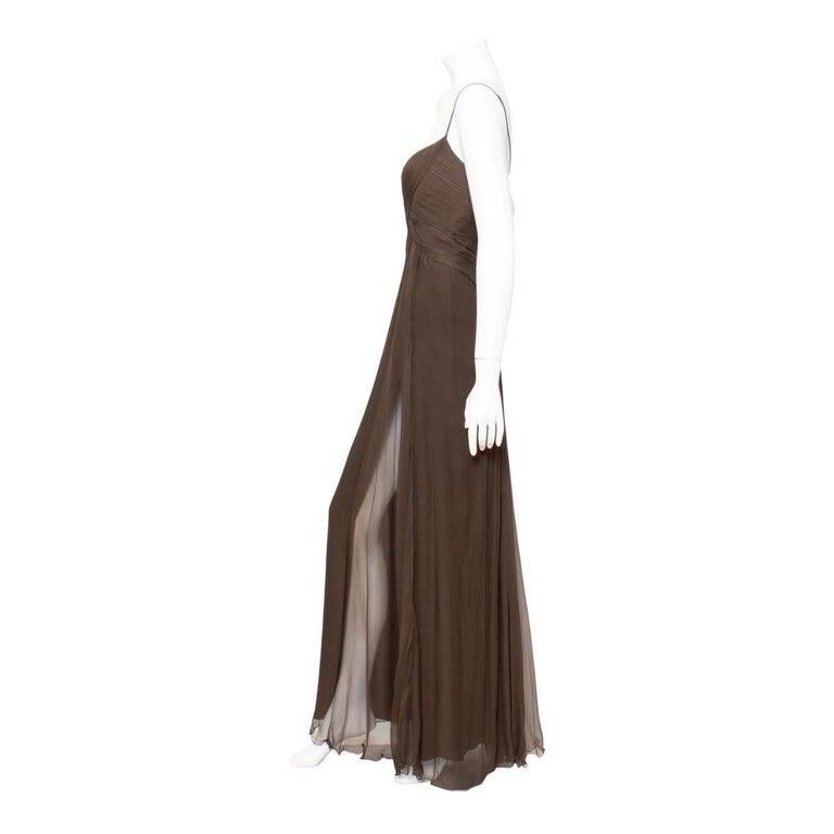 Bob Mackie 1980s Brown Silk Chiffon Gown

Description

Silk Chiffon Gown by Bob Mackie
Circa 1980s
Iridescent brown
Gathered bustier bodice
Double spaghetti straps; split to form a triangular shape in back
Semi-sheer top layer with peekaboo slit