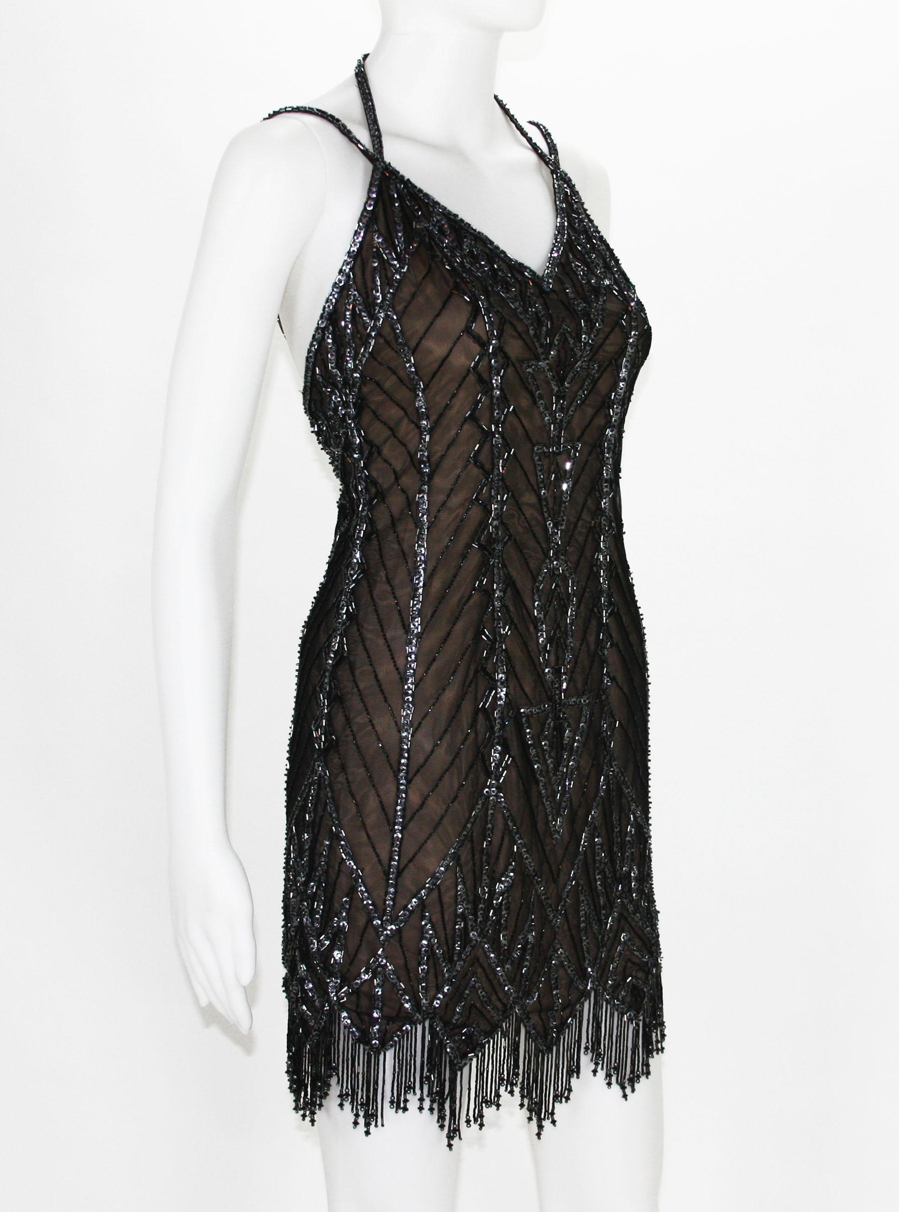 Bob Mackie Black Mini Fully Beaded Dress
The dress from Fall/Winter 1991 show in New York. 
Designer size - 4 (please check measurements).
Measurements: Length - 32 inches includes fringe, Bust - 32/34, Waist - 26/28. Dress have some
