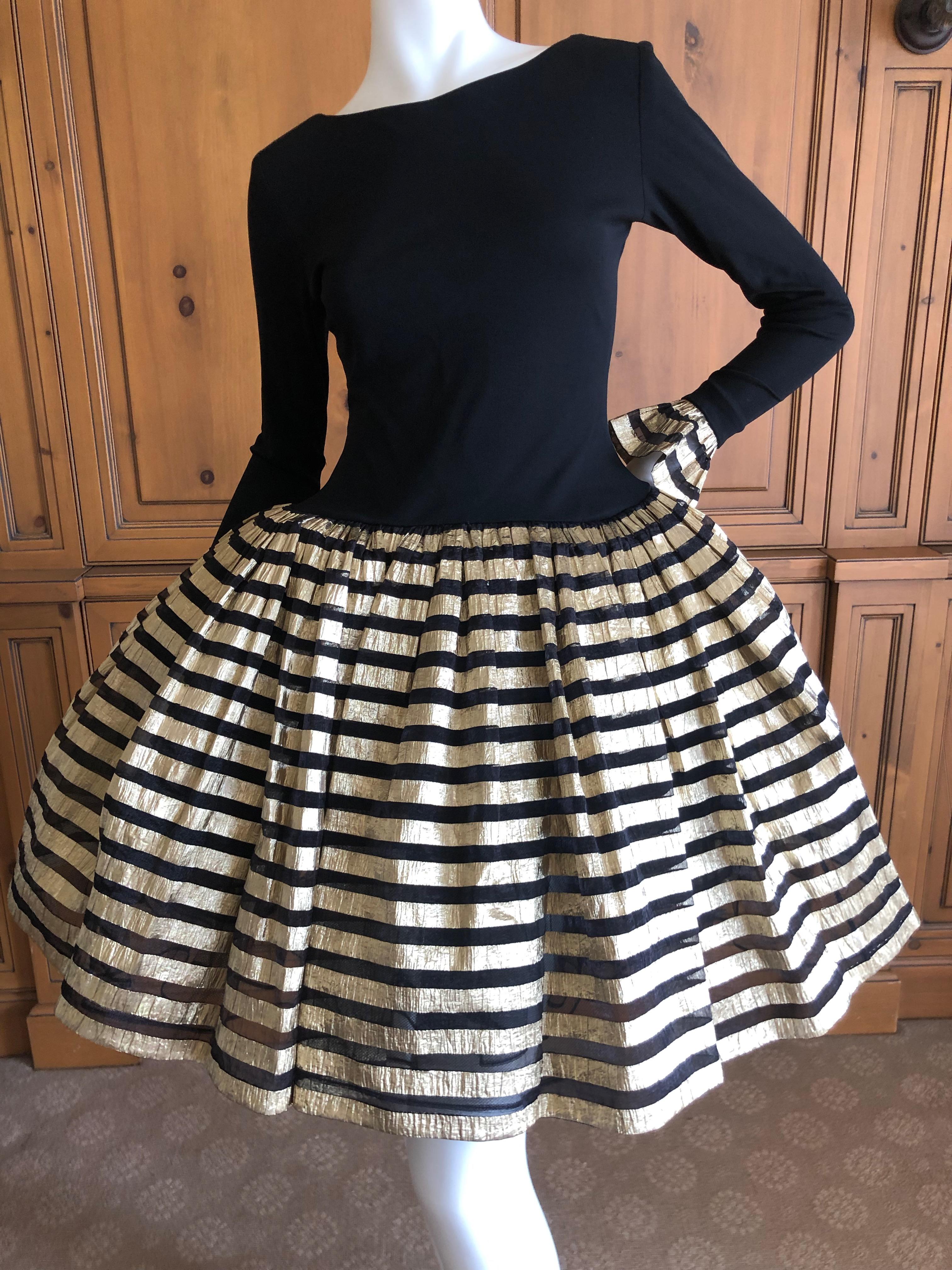 Bob Mackie Gold and Black Vintage Cocktail Dress w Ballerina Skirt & Petticoats
Size 6
So much prettier than the photos, please use zoom feature to see details, the gold is much shinier in person.

Bust 34