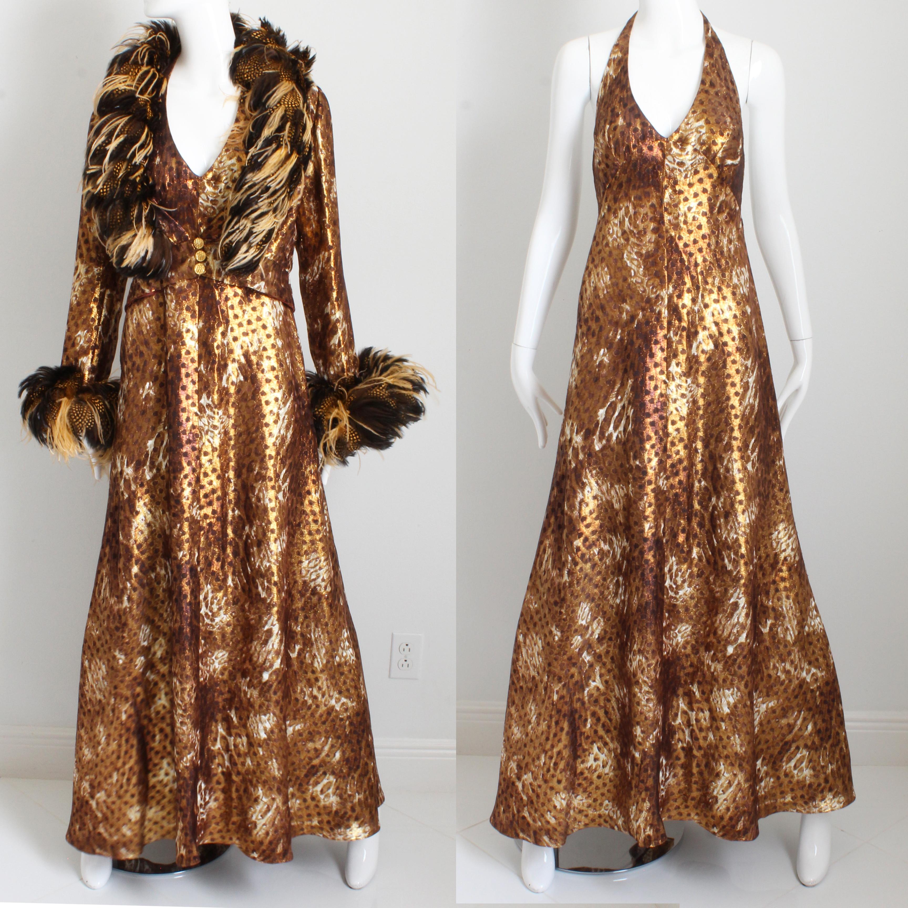 Authentic, preowned, vintage Bob Mackie x Ray Aghayan 2-piece halter evening gown with matching feather trim cropped jacket, likely made in the 1970s.  The halter dress is floor length and made from a bronze-hued metallic or lame' abstract animal