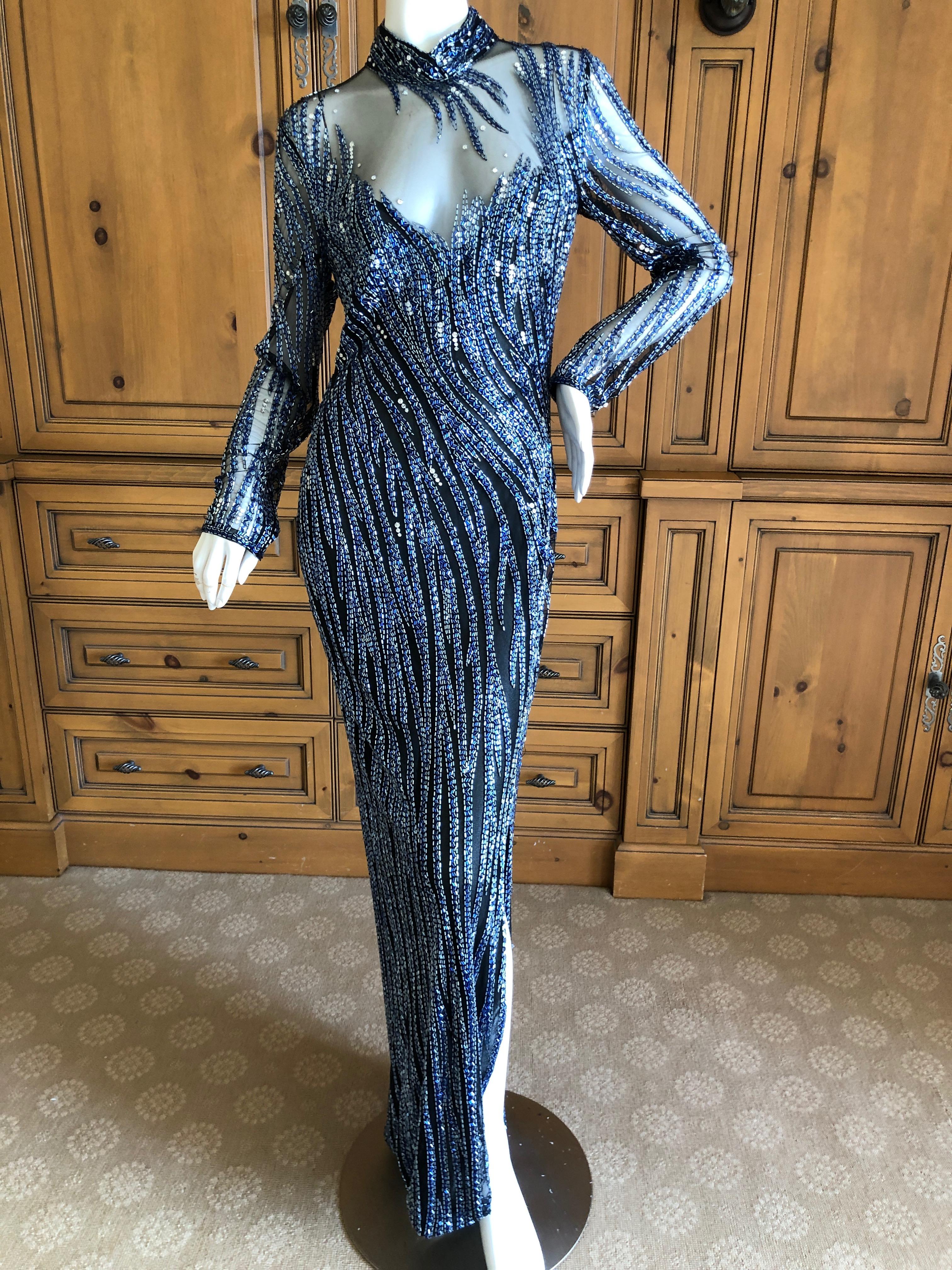 Bob Mackie Nieman Marcus 1980's Crystal Beaded Sheer Evening Dress
Sheer netting embellished with thousands of glass bugle beads, this is classic Mackie at his best.
So much prettier than the photos, please use zoom feature to see details.
Size 8-10