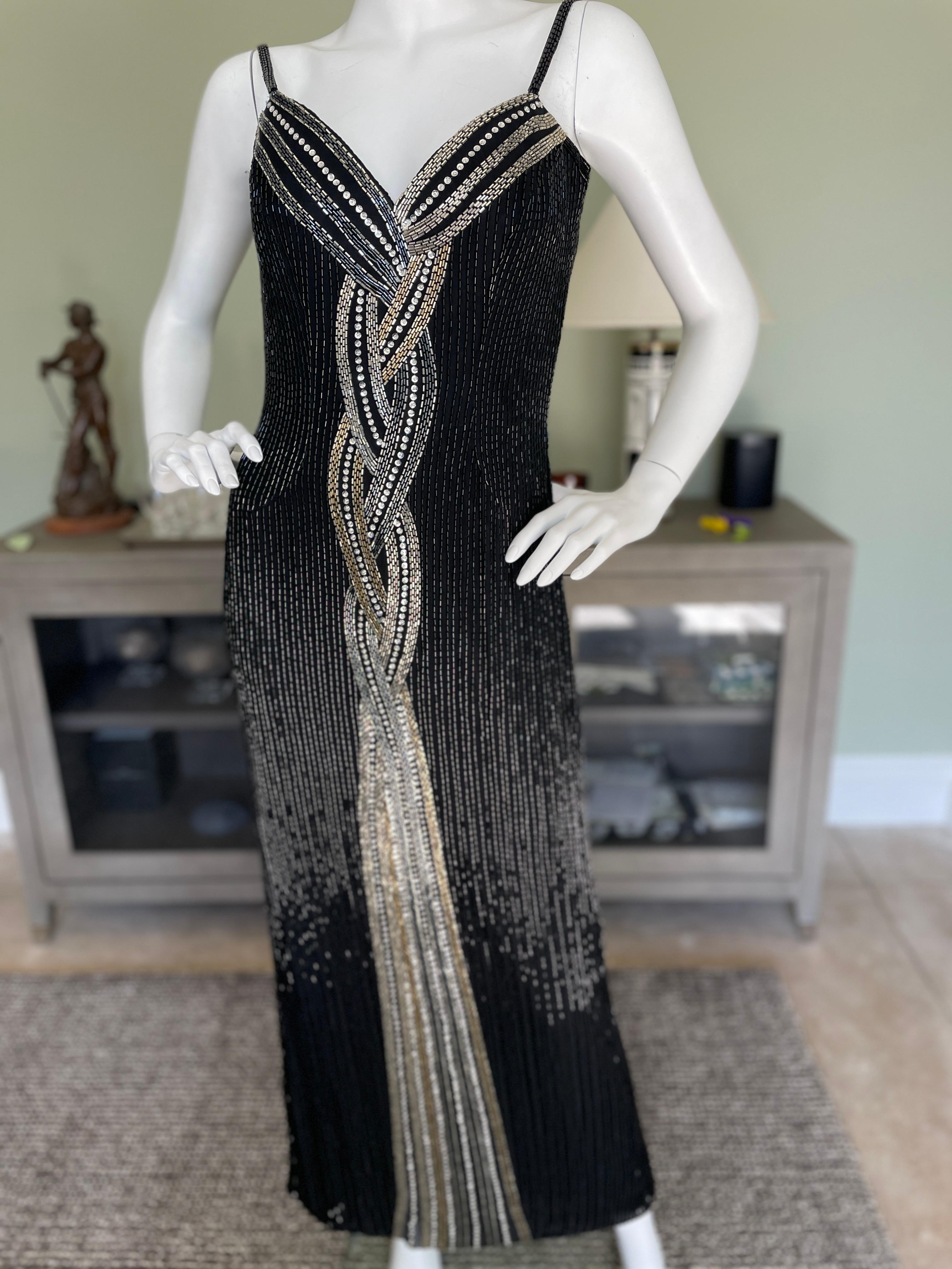 Bob Mackie Black Bugle Beaded Waterfall Evening Dress
Entirely embellished with black bugle beads, please use the zoom feature to see details.
Size 4-6 (there is no size tag)
Bust 34