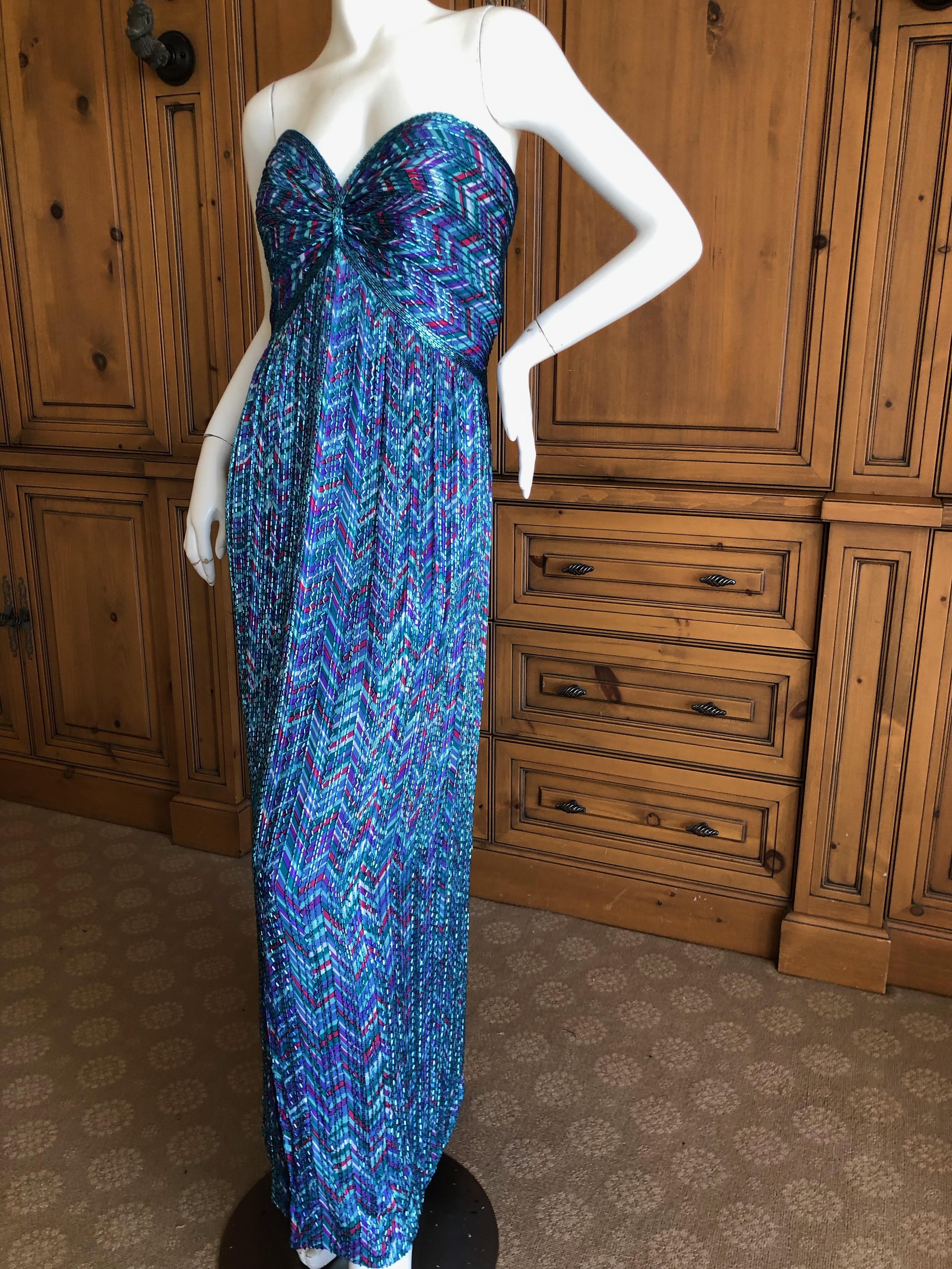 Bob Mackie Vintage 70's Strapless Bugle Beaded Embellished Silk Evening Dress.
So much prettier than the photos, please use zoom feature to see details.
Size 12
Bust 36