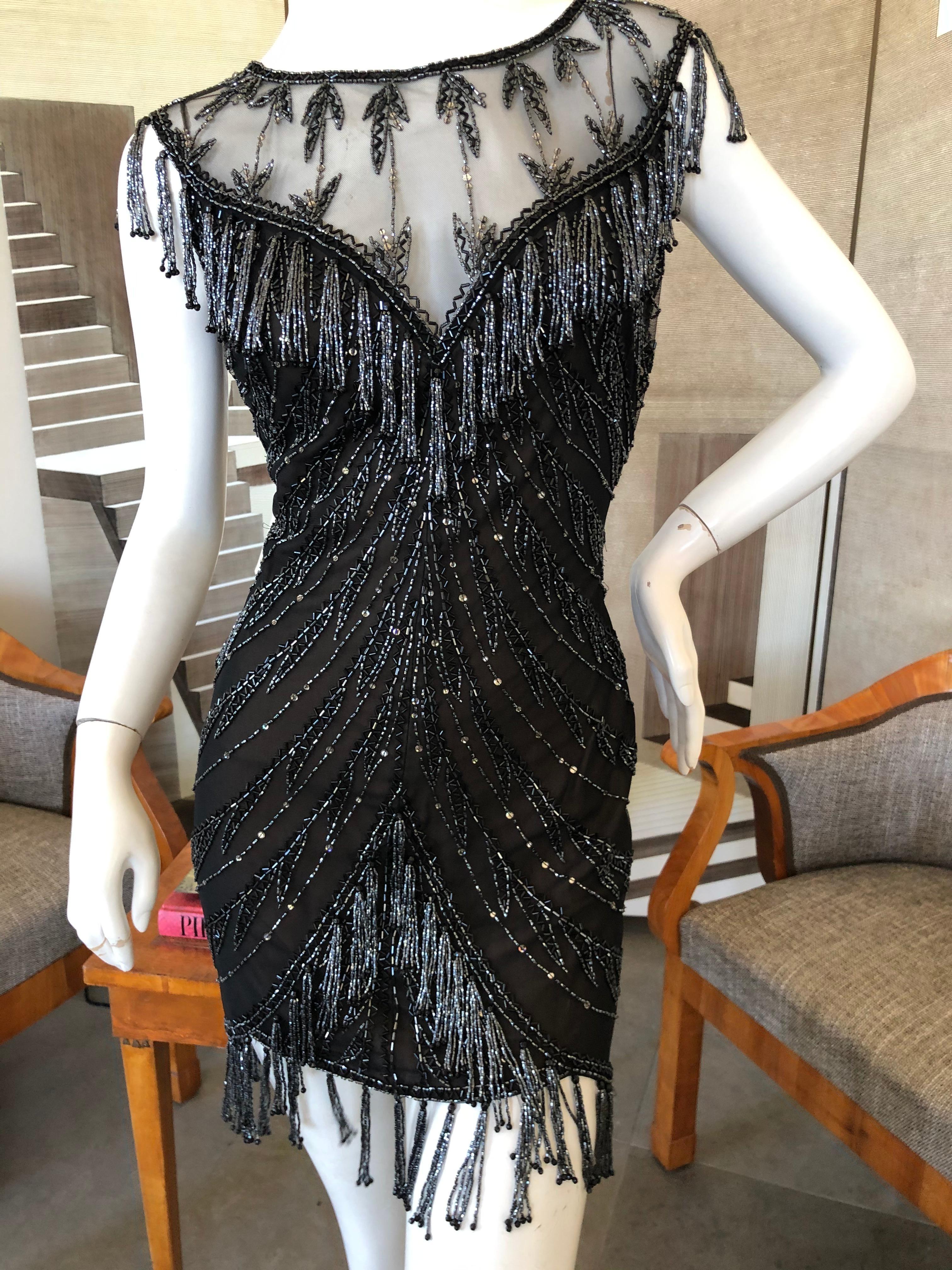 Bob Mackie Vintage Sheer Little Black Dress with Bugle Bead Fringe.
So much prettier than the photos, please use zoom feature to see details.
Size 6 vintage is more like a 4 today
Bust 38