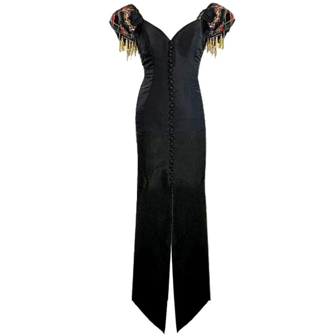 Bob Mackie for Elizabeth Arden- Vintage Black Silk Evening gown with puff sleeves and gold beaded tassels 1990. 
Red version of this gown pictured - The Museum of Fine Arts, Houston
Vintage - Size 6