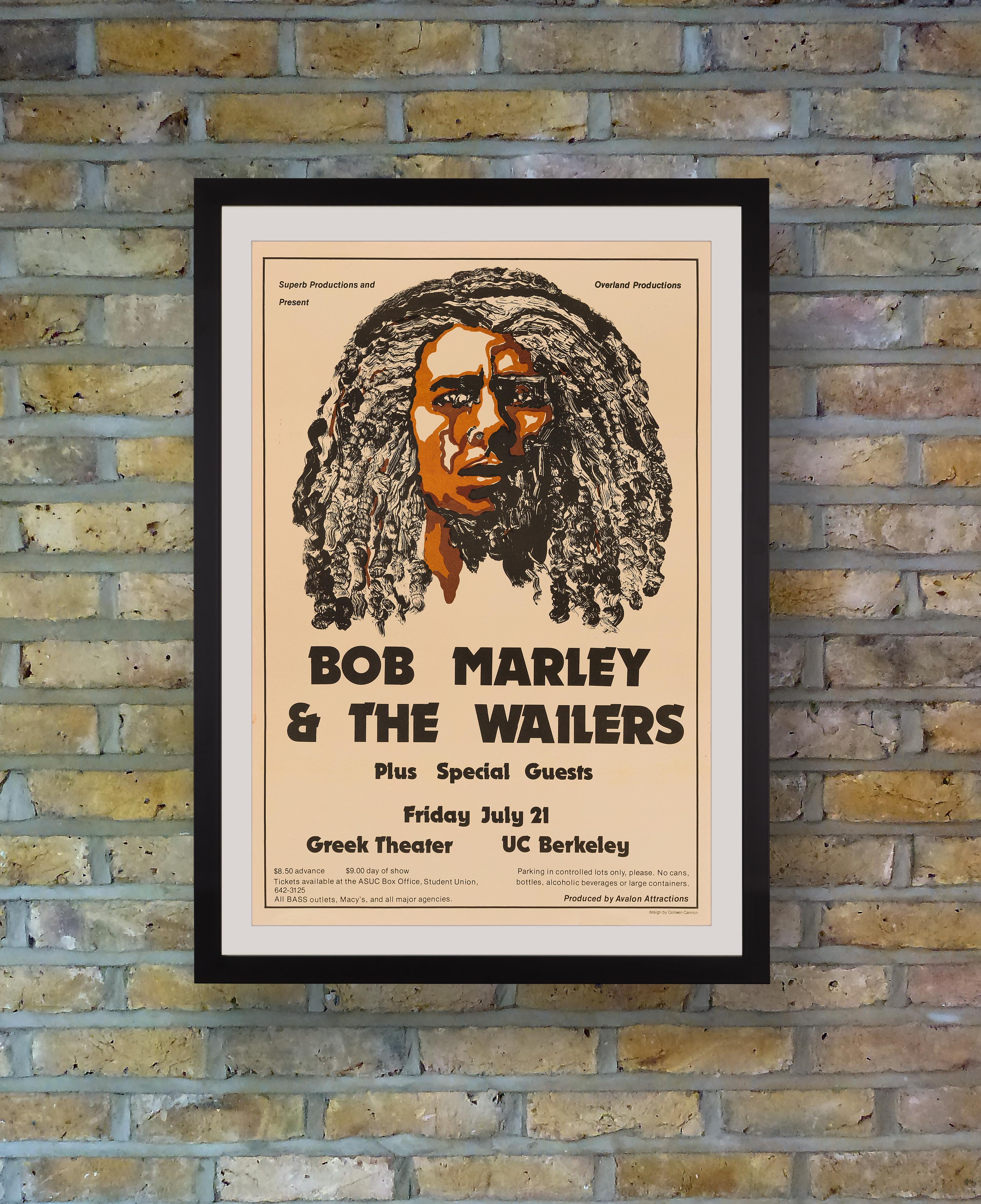 A sought after concert poster by Colleen Cannon for a performance by reggae legends Bob Marley & The Wailers at the Greek Theatre at the University of California, Berkeley, on Friday 21st July 1978 during the Kaya Tour in support of their album