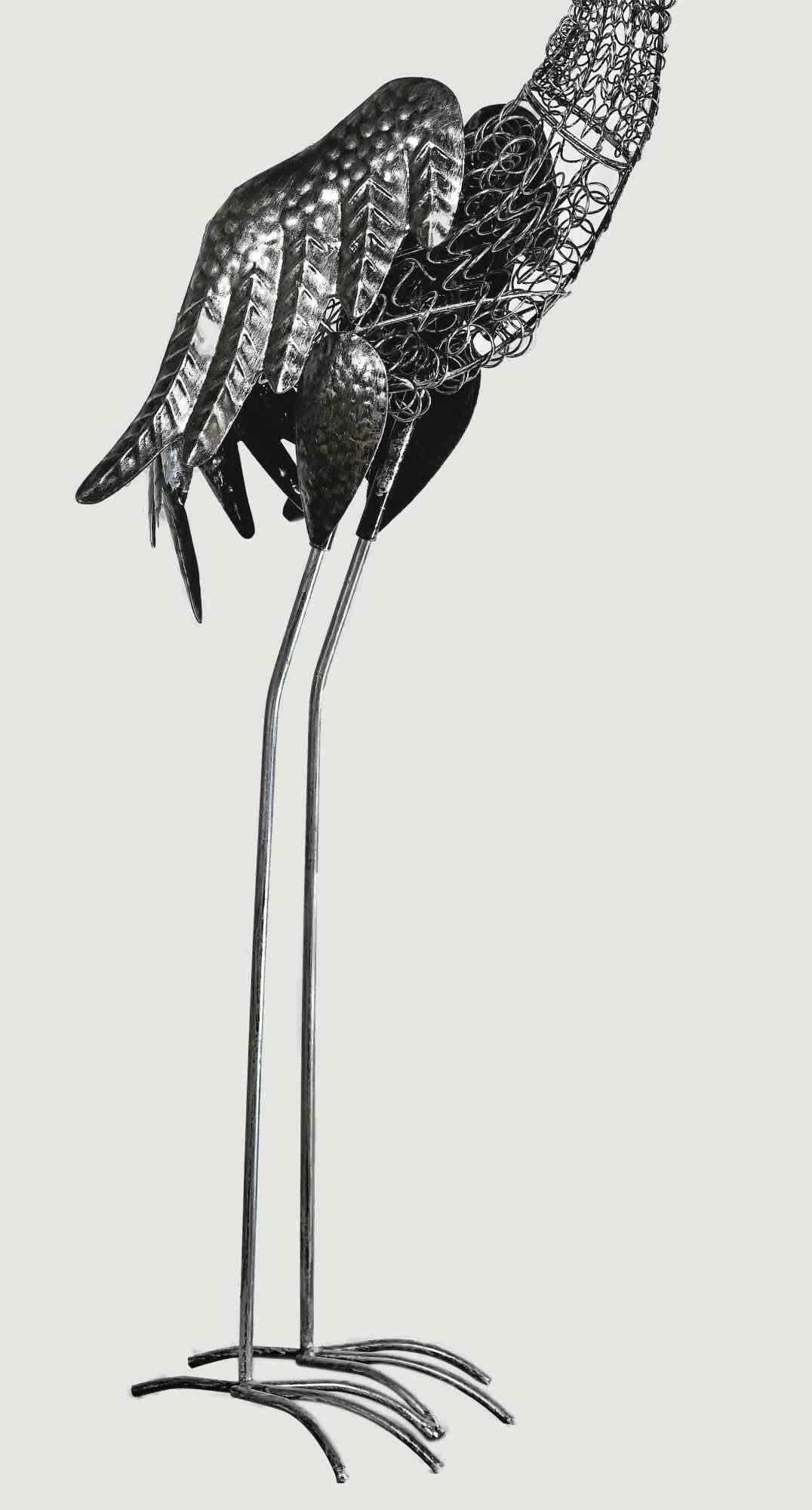 metal heron sculpture