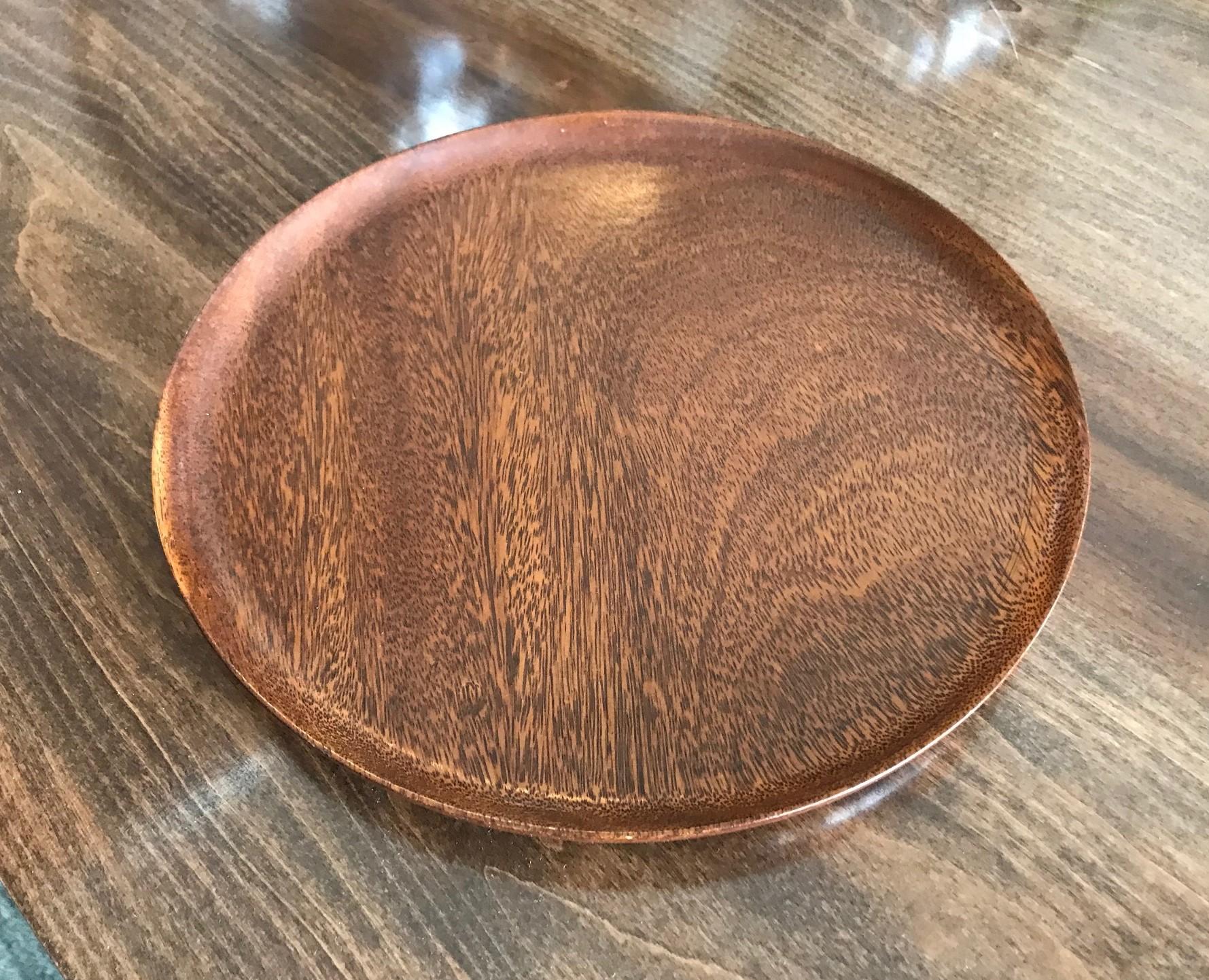 An exquisitely crafted, rich wood plate by American master Woodturner Bob Stocksdale. 

Signed and marked (